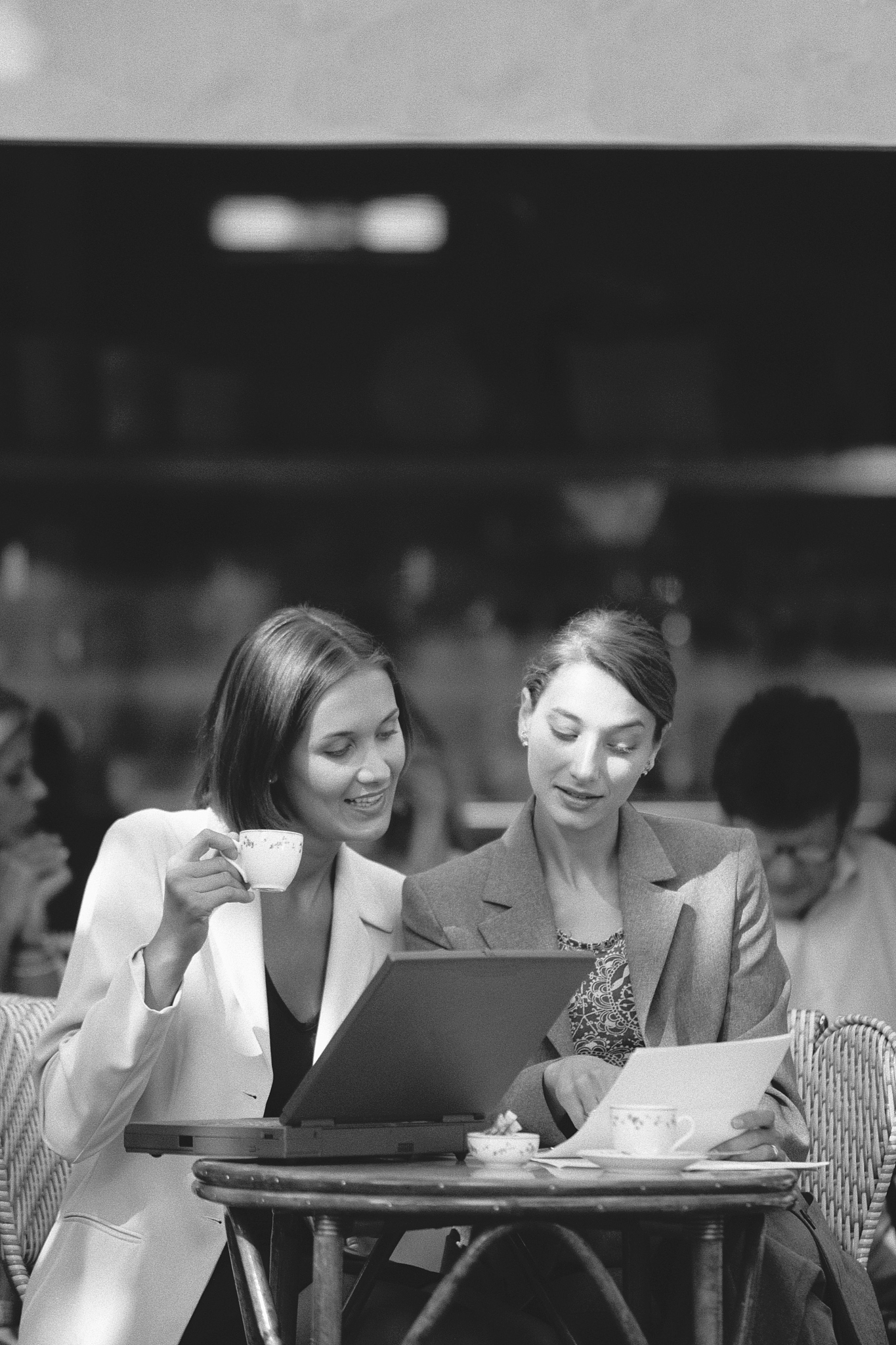 businesswomen reading a document