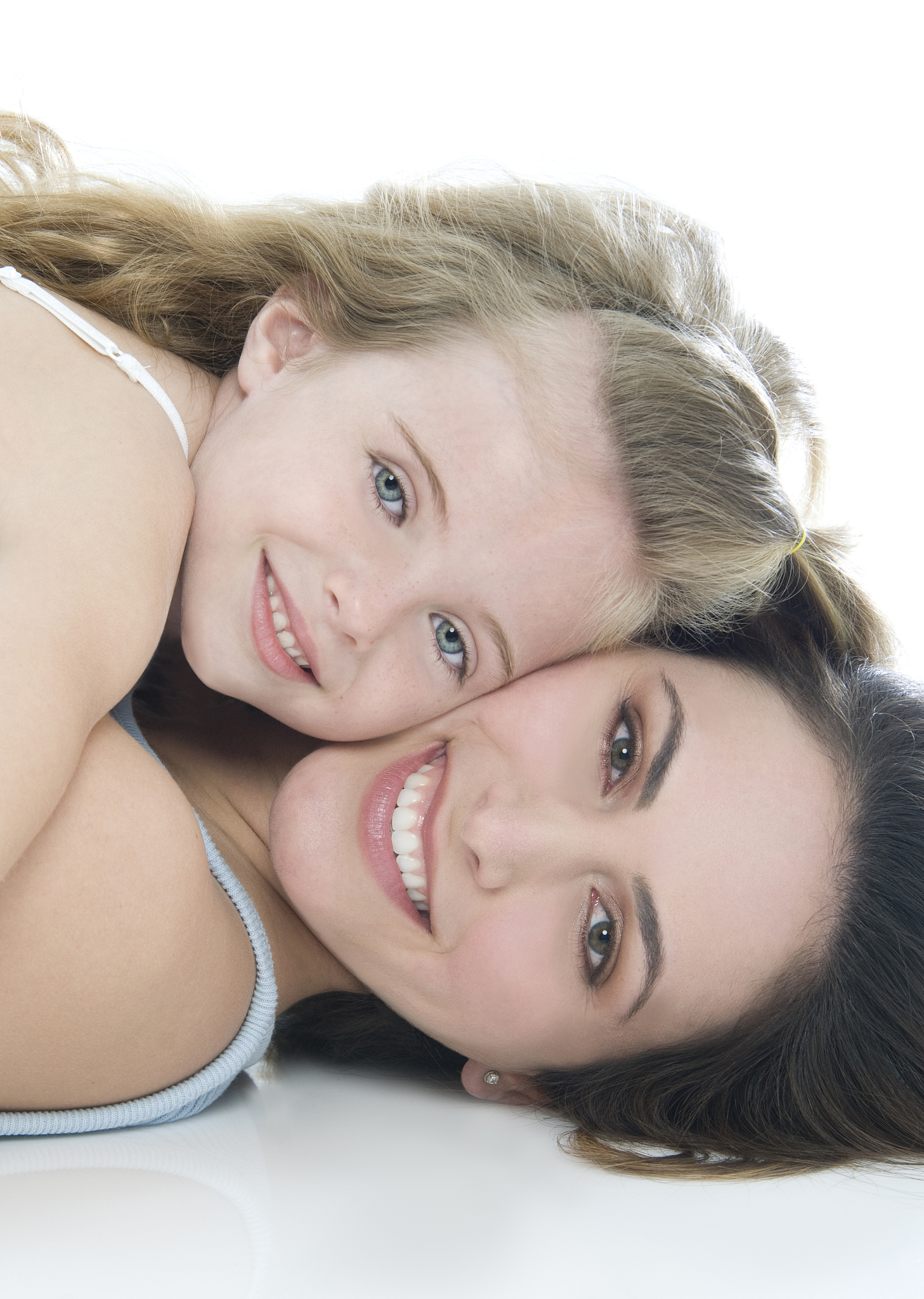 mom and daughter on white