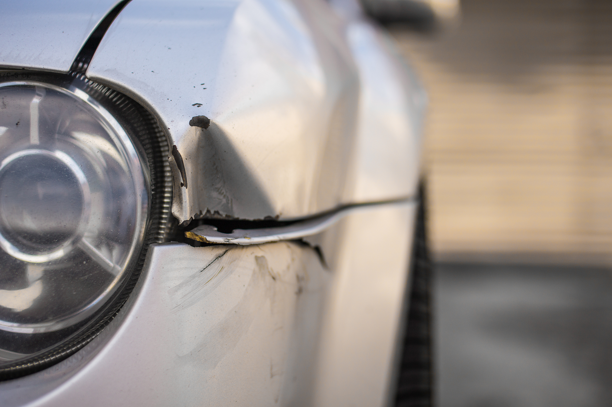 car damged and dented in an accident