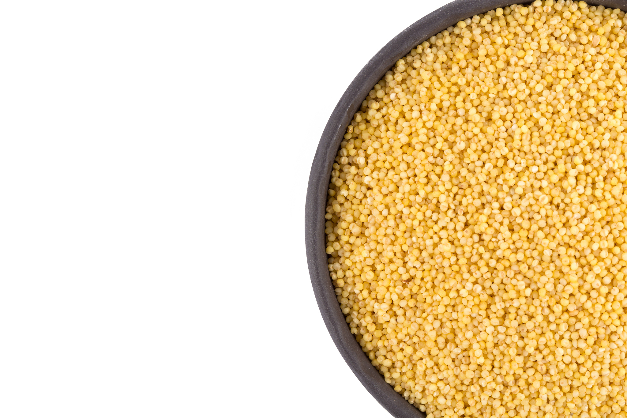 dry millet isolated on white. top view or flat lay. healthy food