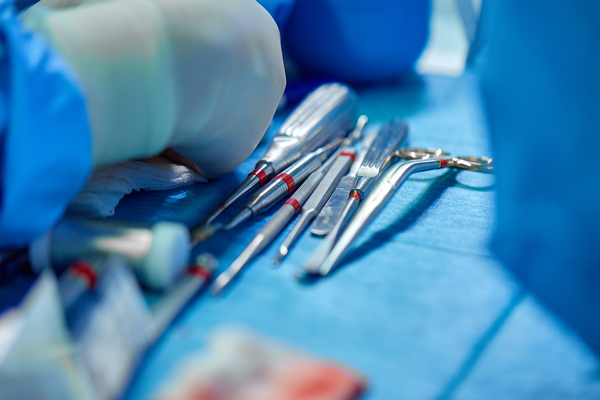 close up of doctor hands during surgery in operation room. steri