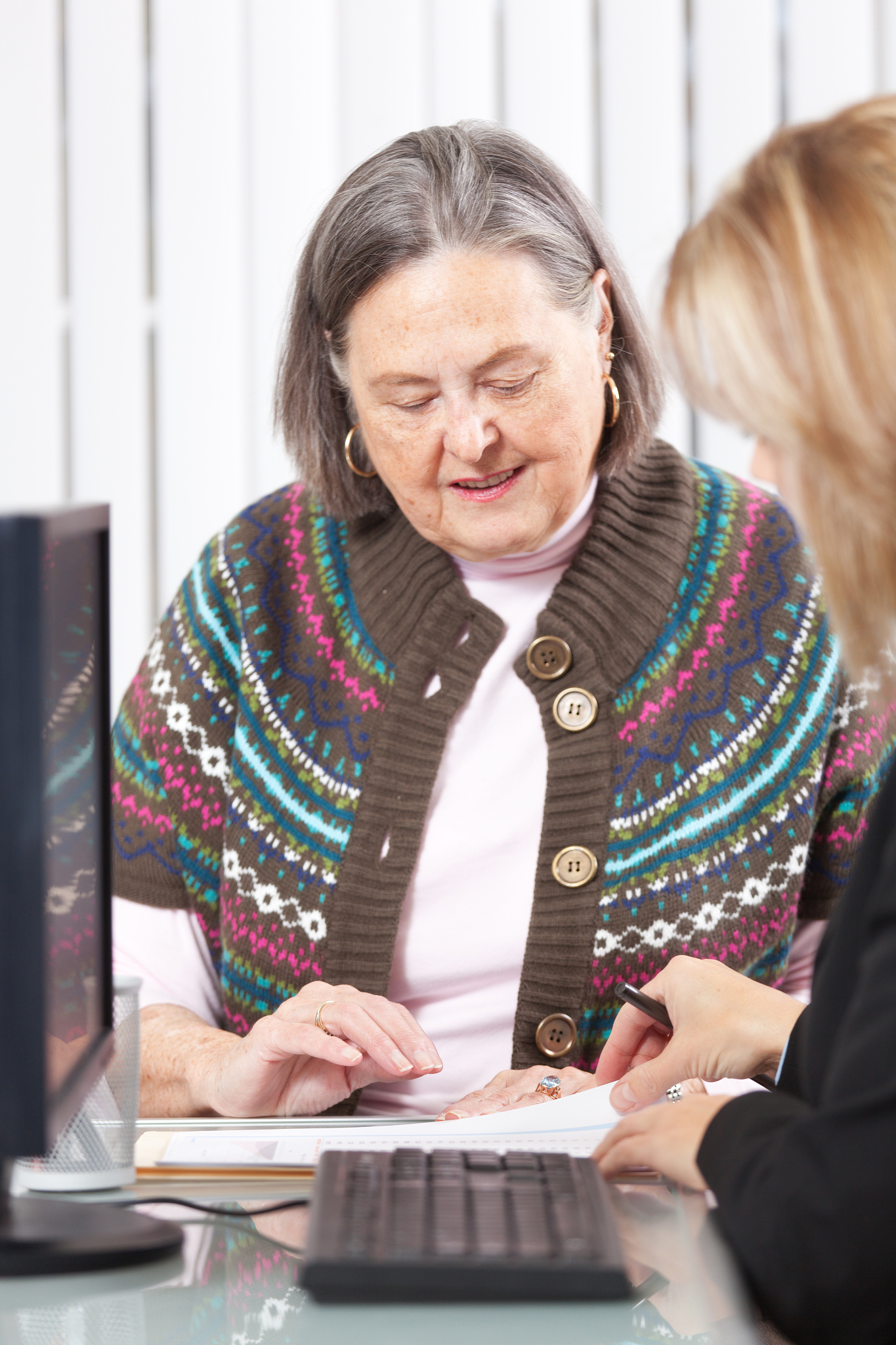 senior woman working with banking and financial advisor vt