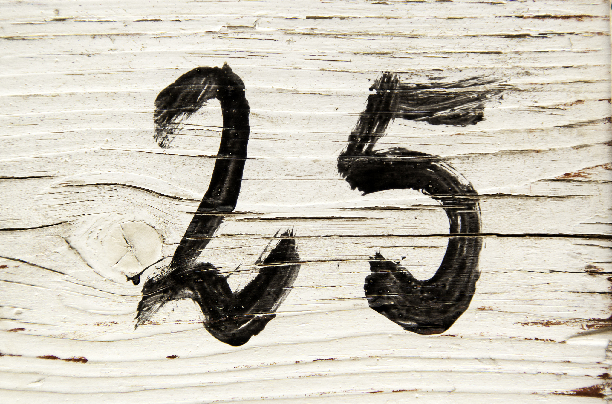 number twenty-five in wood