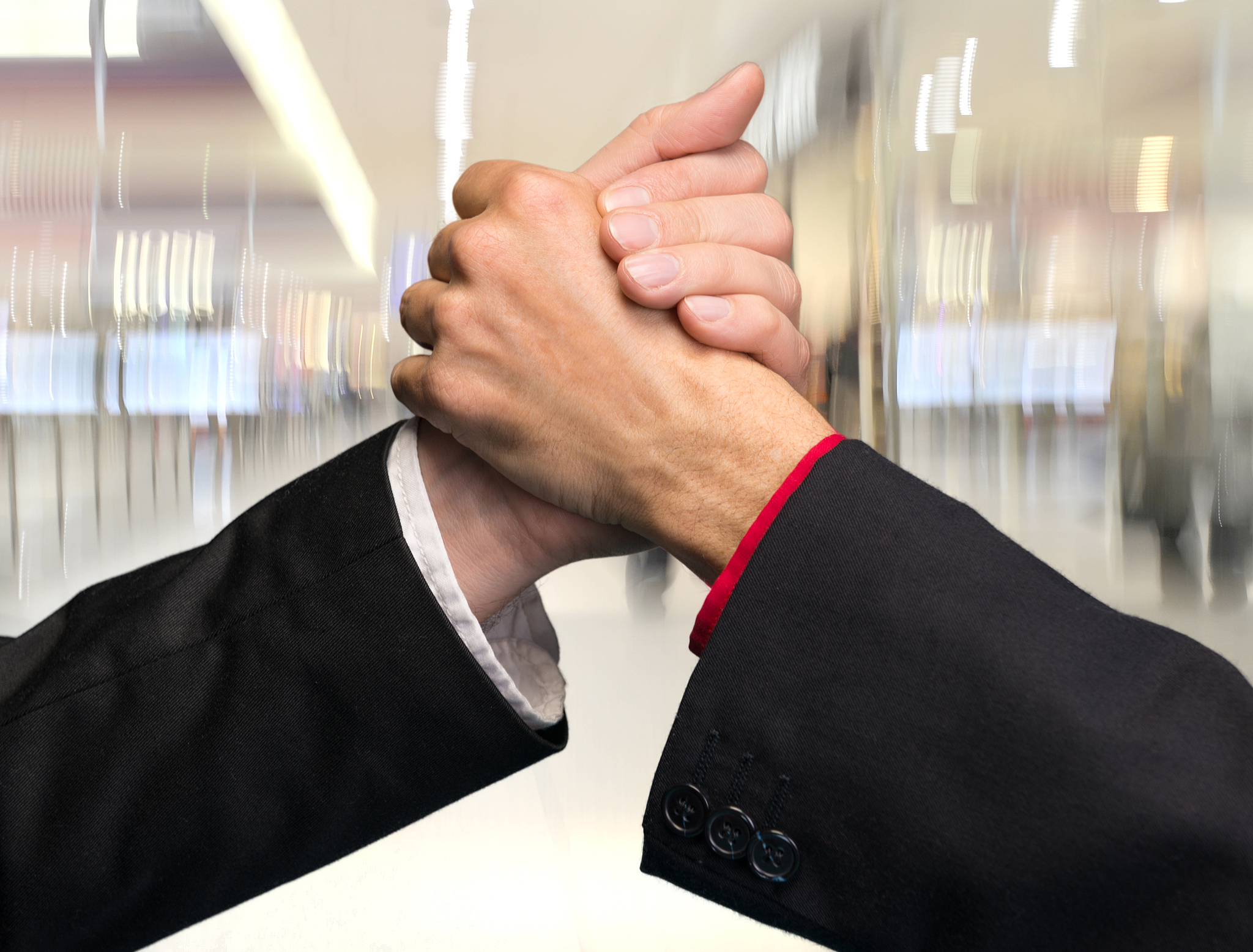 two businessmen shaking hands