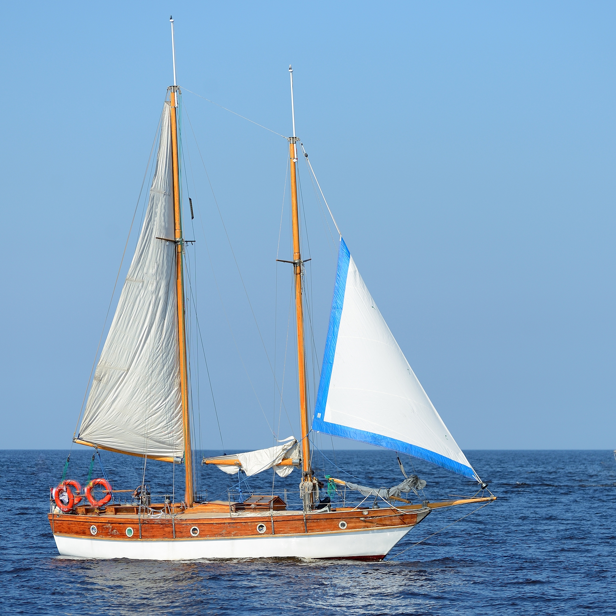 sailship in the open sea on a sunny summer day