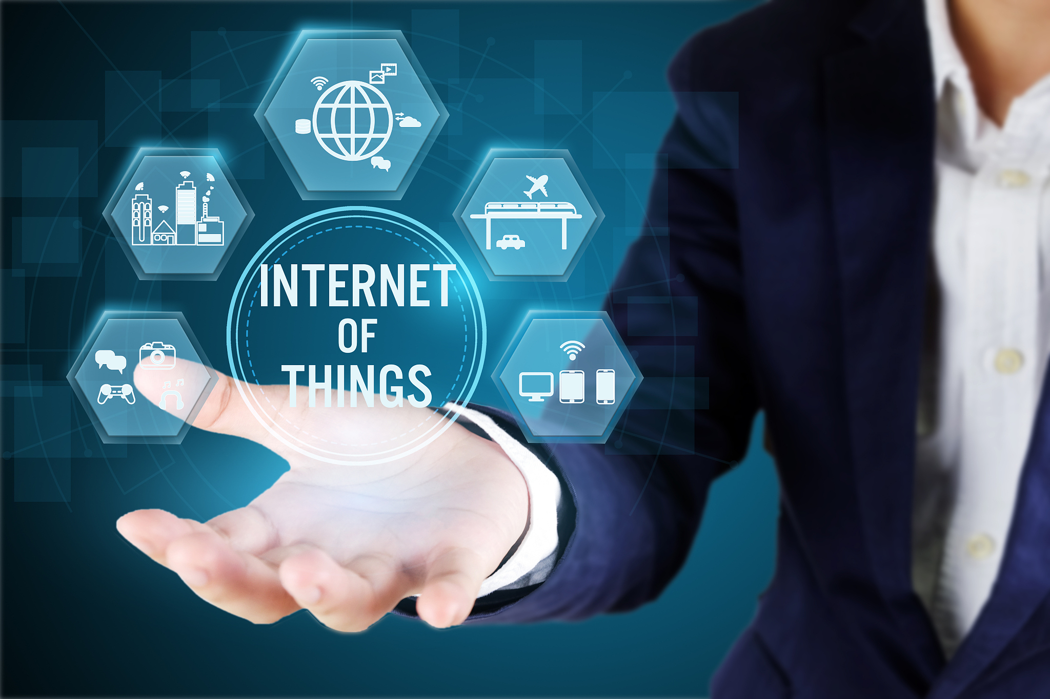 businessman holding icon of iot.internet of things technology co