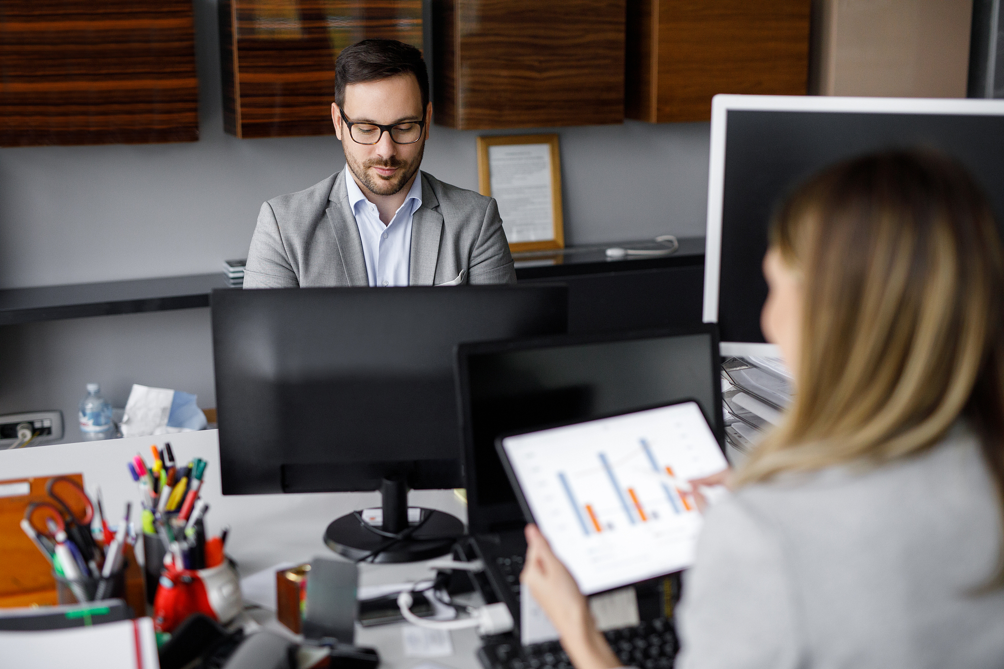 portrait of a businessman working at his office desk