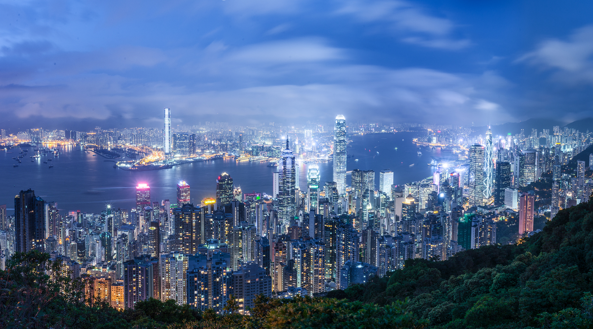 hong kong. view of victoria harbor at night
