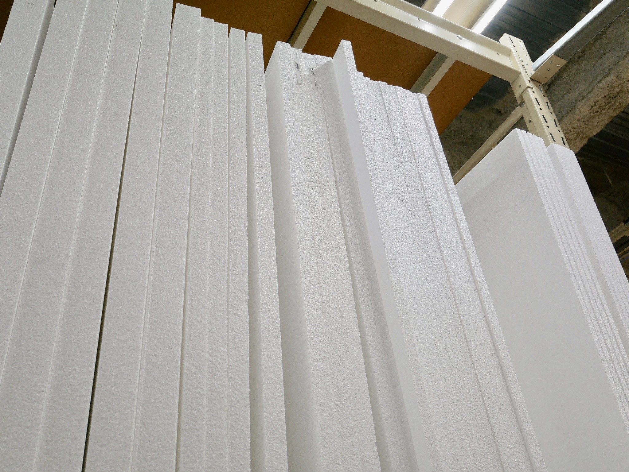 Write a paragraph about the material composition of eps sandwich panels in 70 words