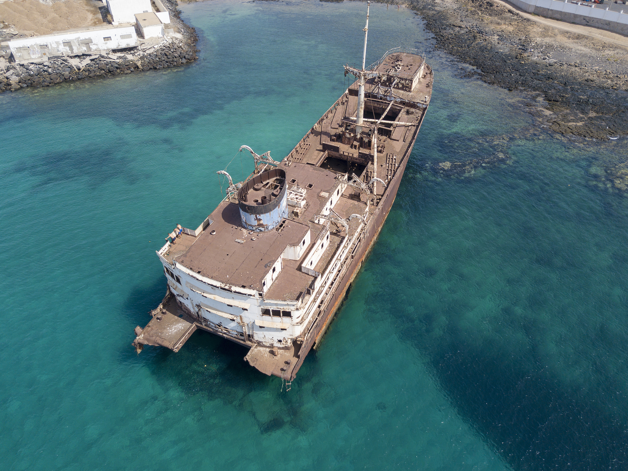 aerial view of a wreck of a ship in the atlantic ocean. lanzarot