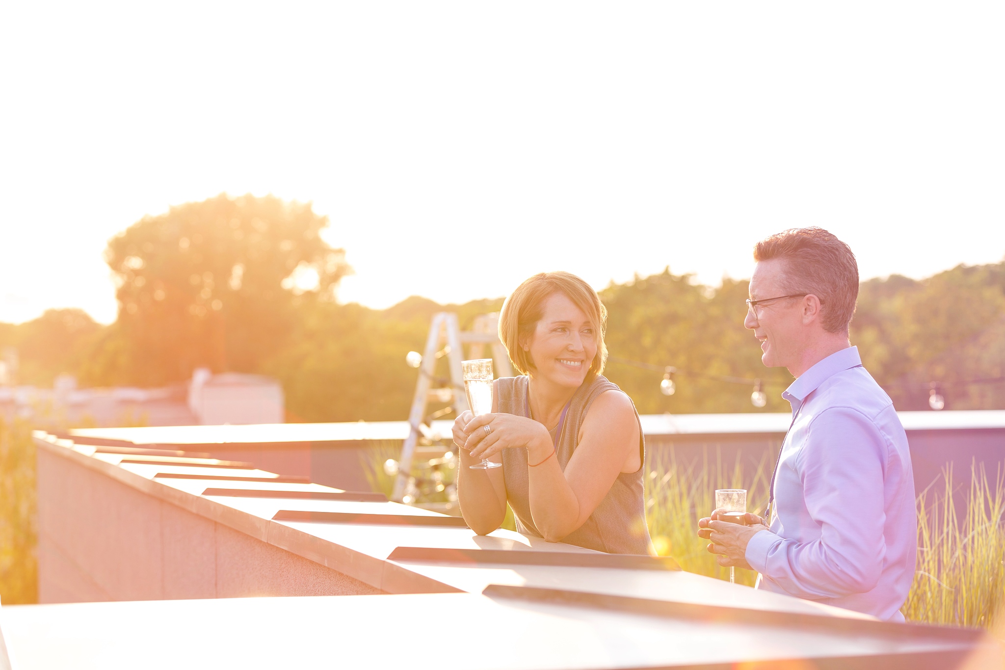 business people on a rooftop party.
