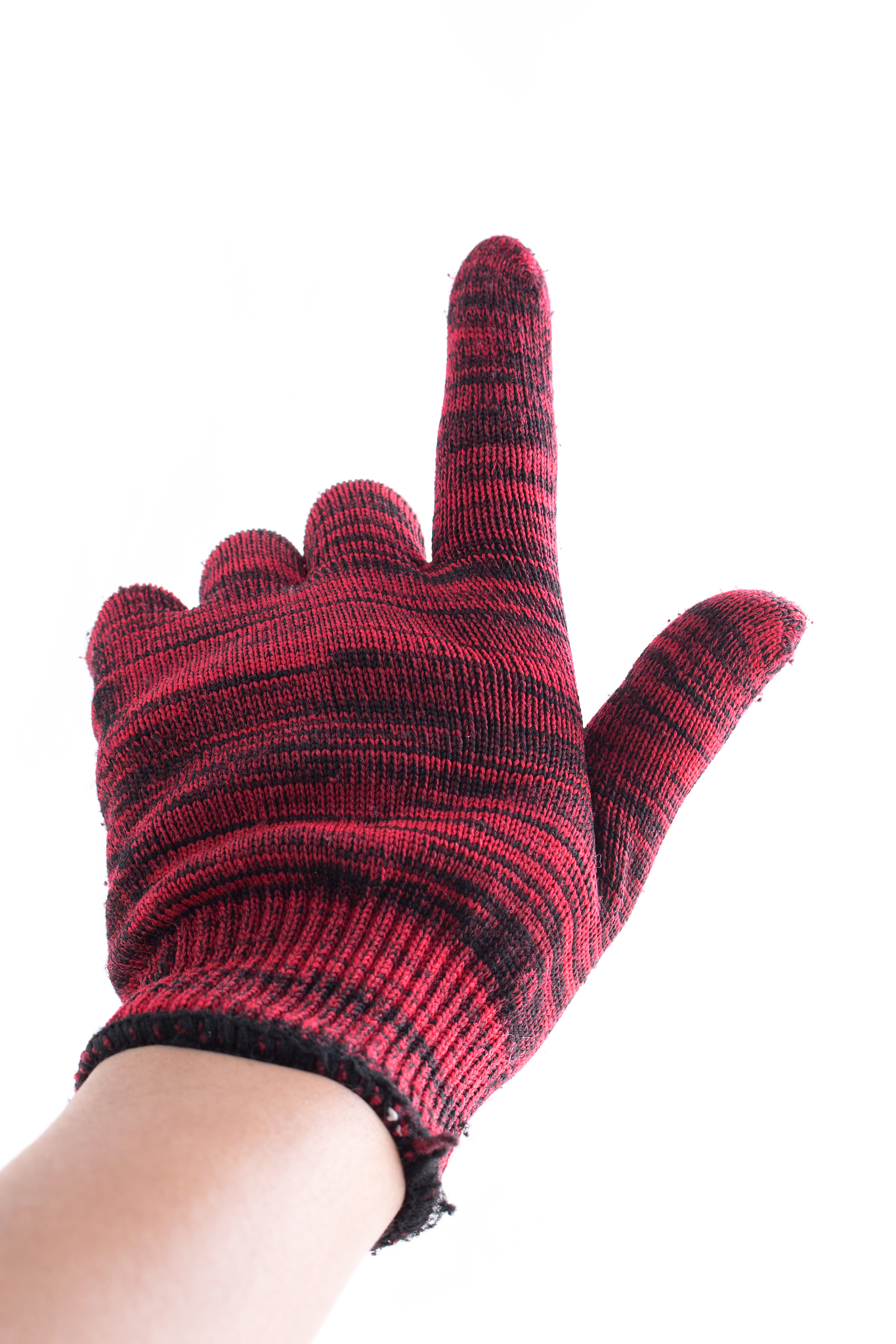 hand holding finger in glove on a white background.
