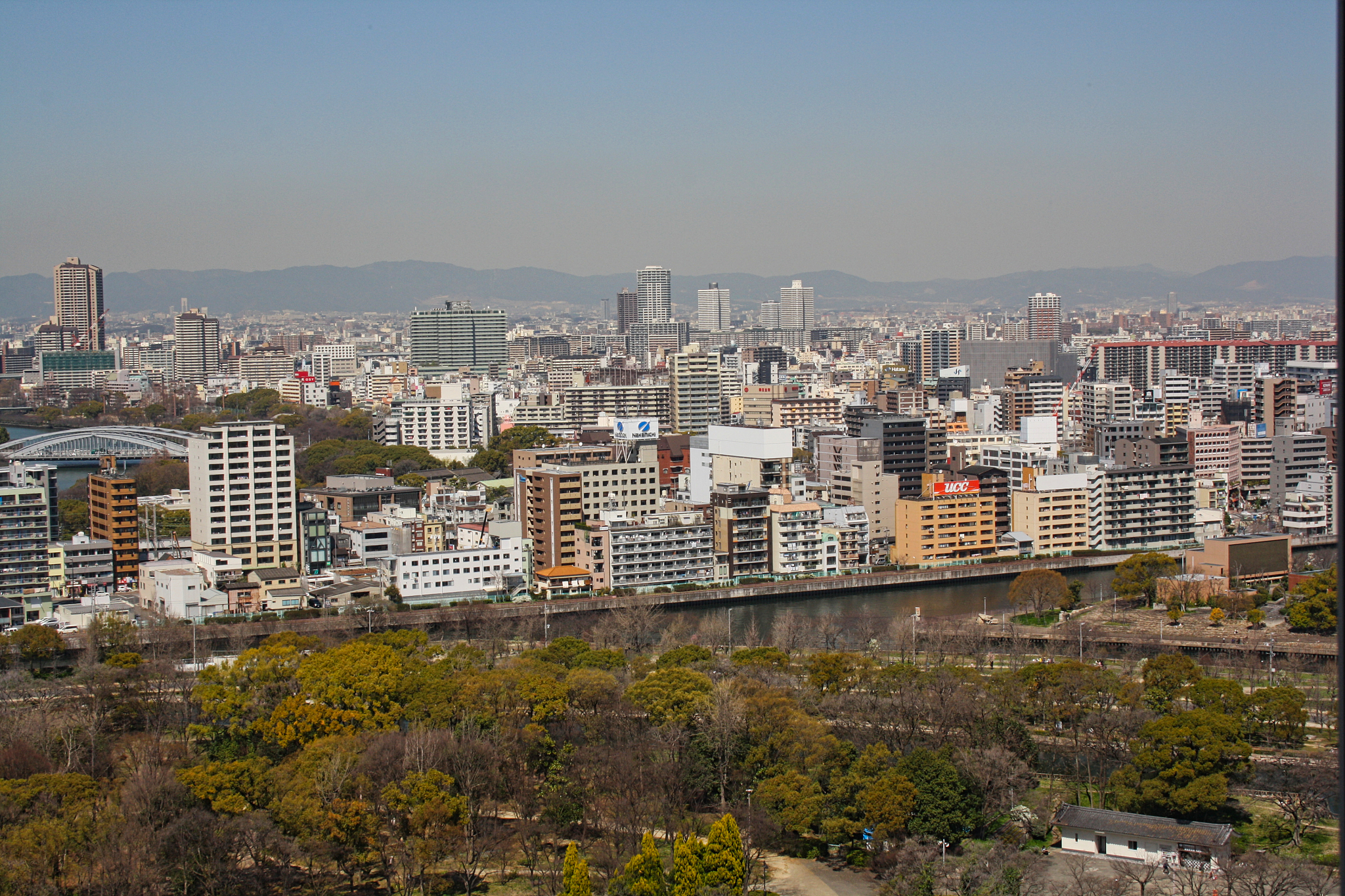 high angle view of buildings in city against clear sky
