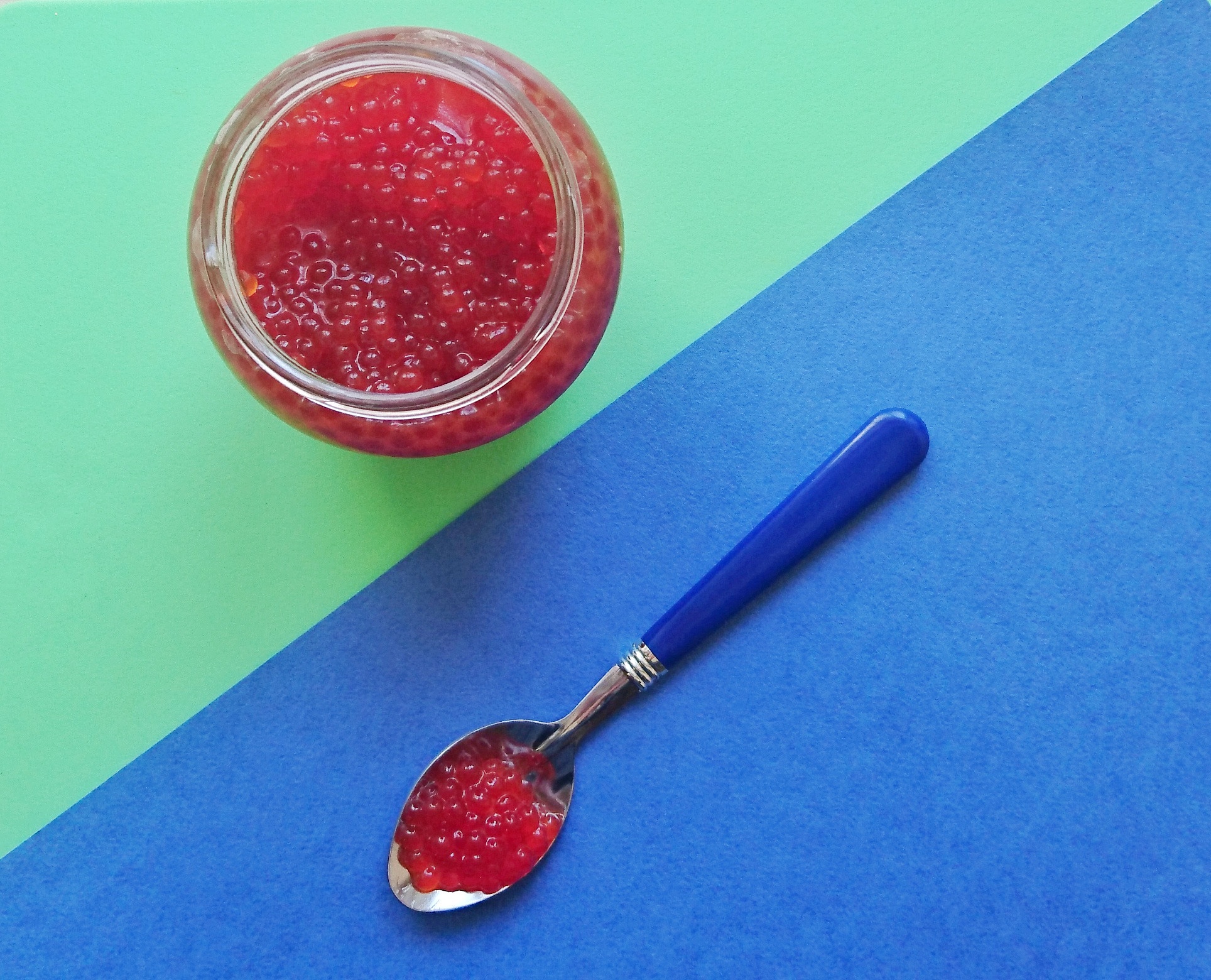 red caviar of salmon fish in a glass jar