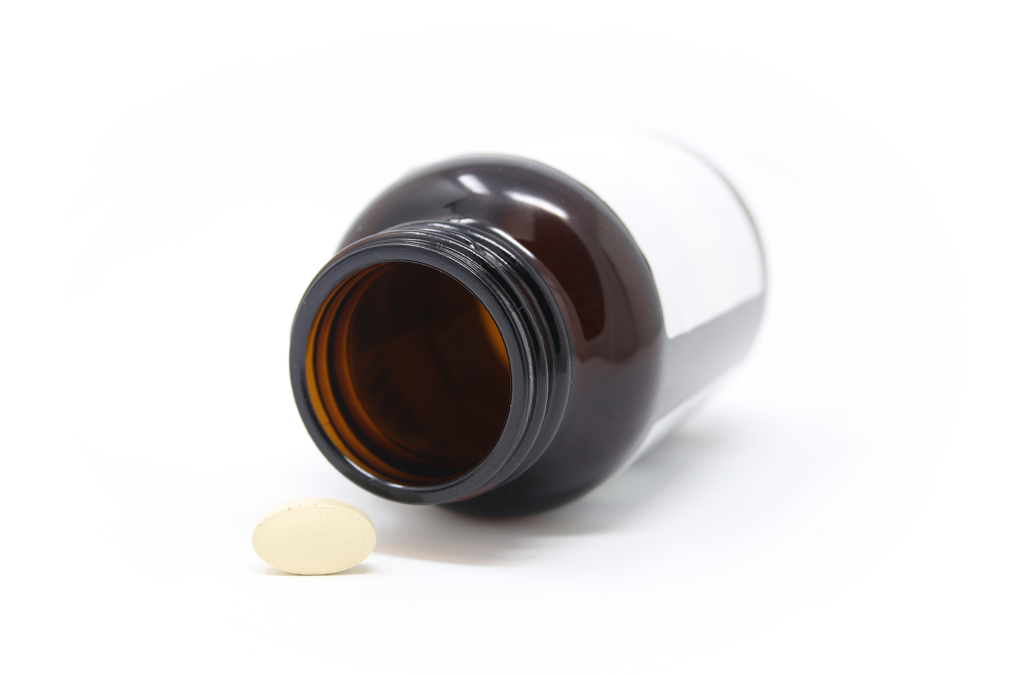 generic brown glass medicine / drug / pill bottle with pale colo