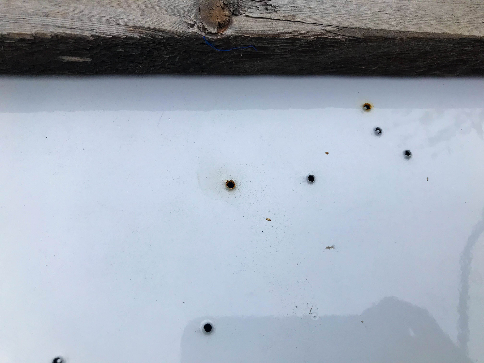 texture. damaged silver metal sheet. holes on metal, corrosion, 