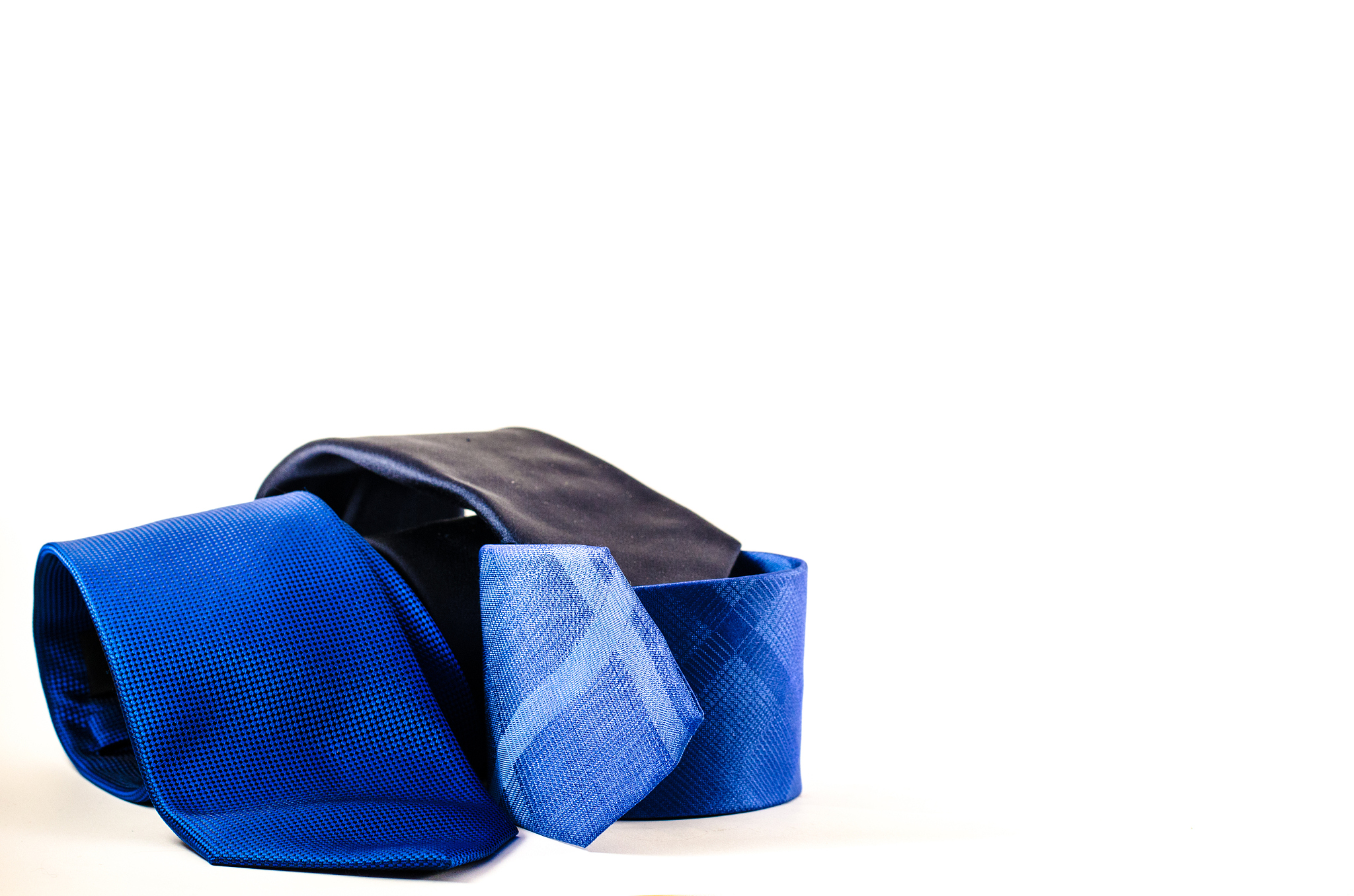 three blue ties