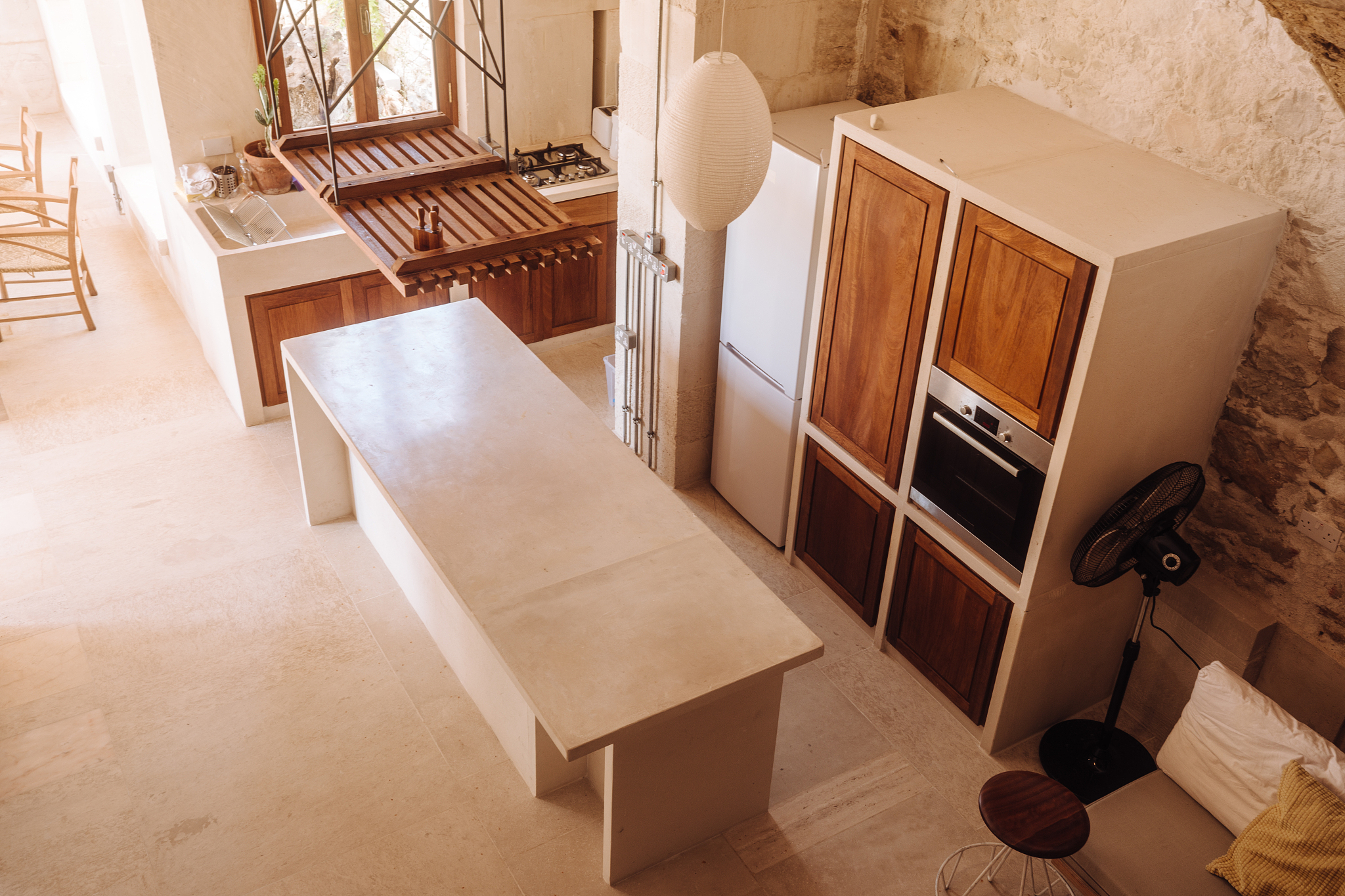 modern architecture kitchen built with marble, stone and wood