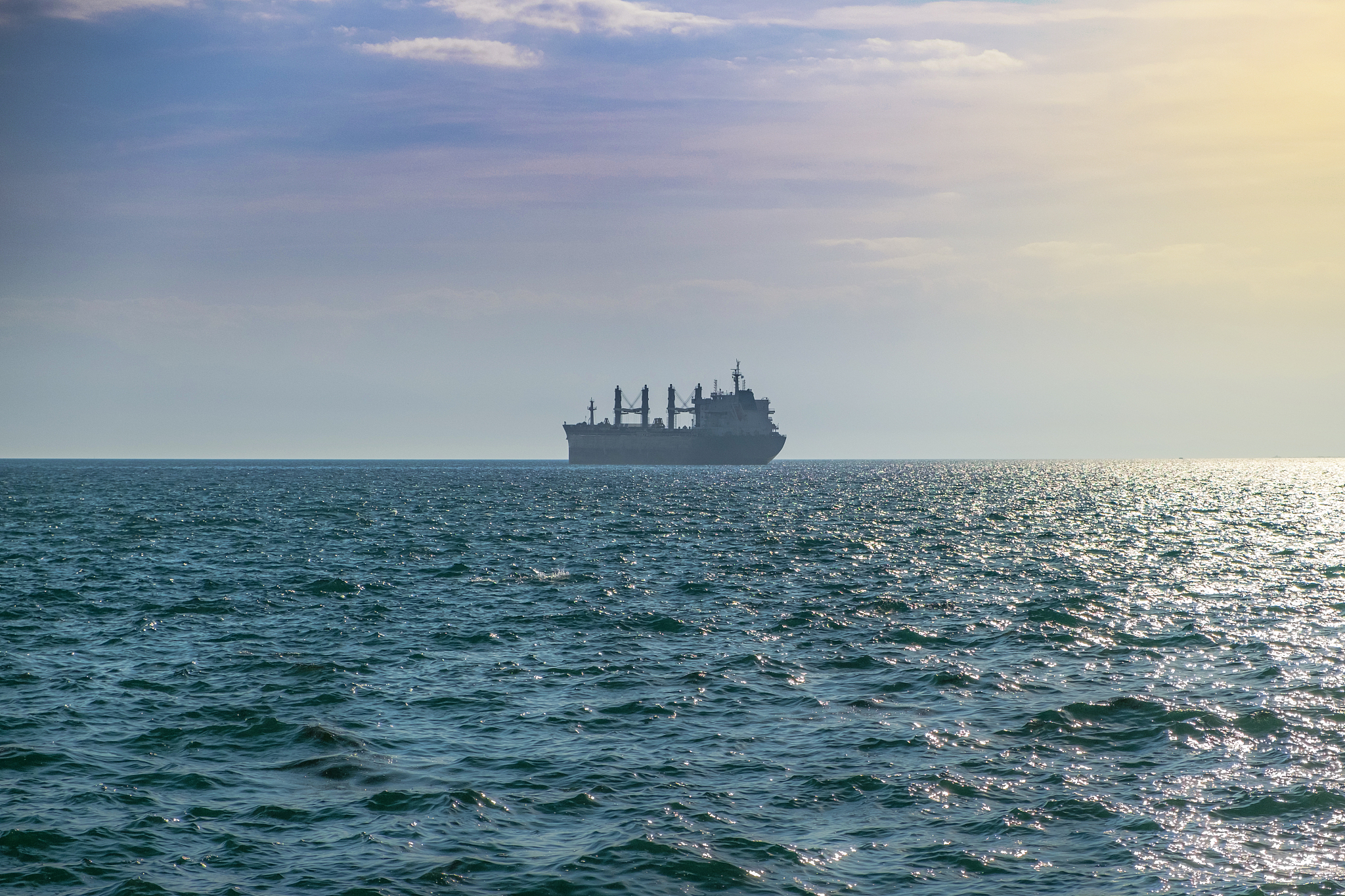 container transport ship in the open sea