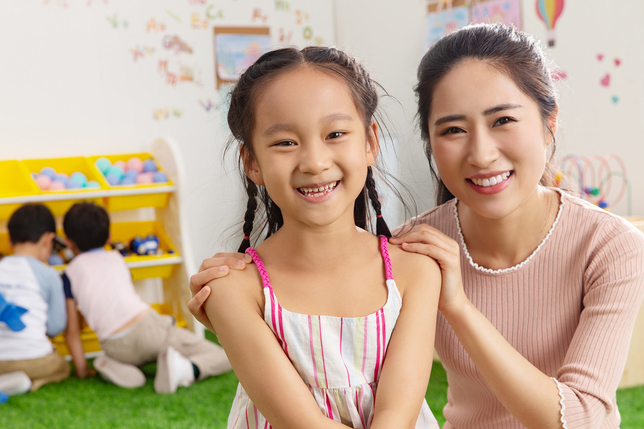 kindergarten teachers and kids