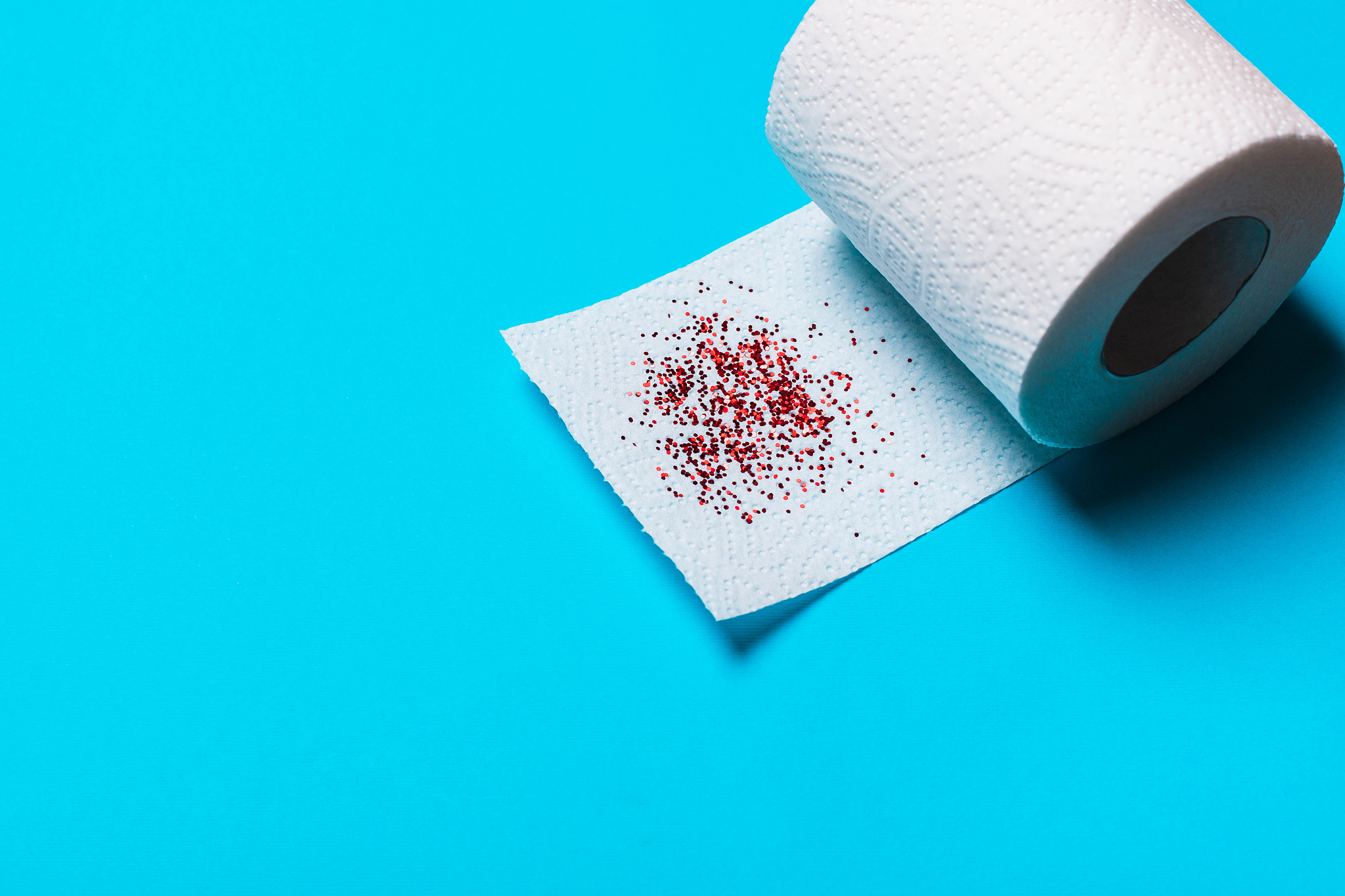 hemorrhoids treatment concept, toilet paper with blood