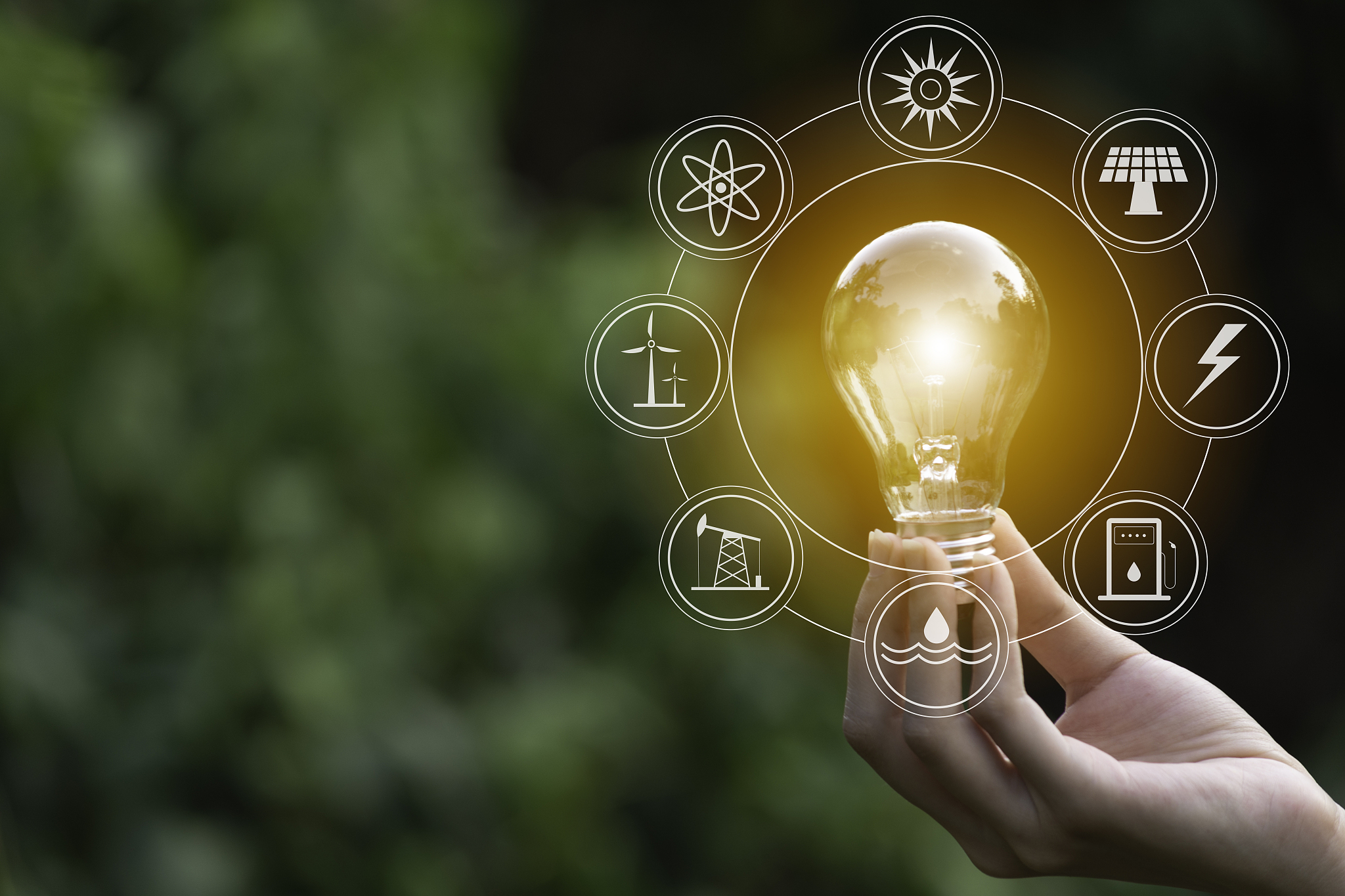 hand of male holding a light bulb and copy space. ideas and crea