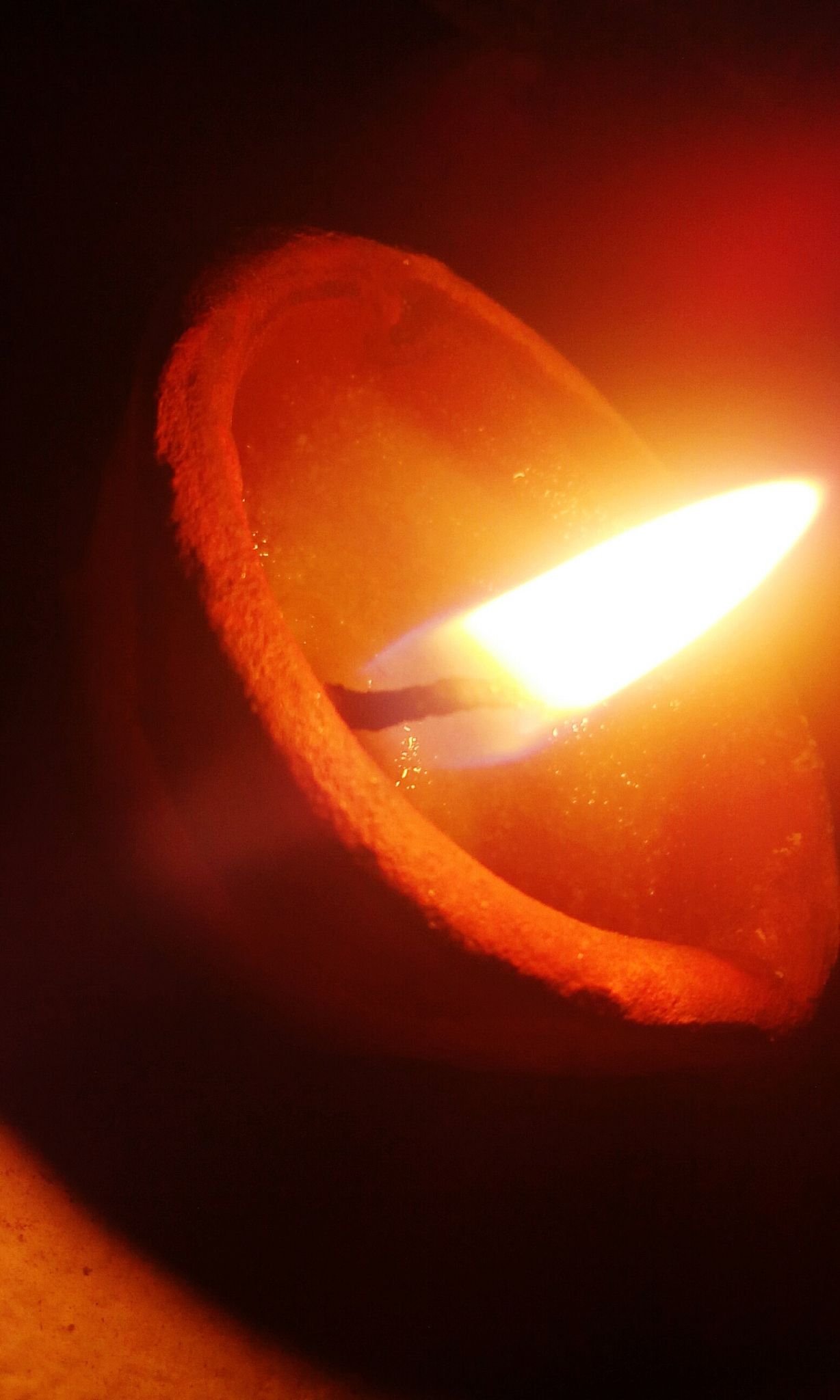close-up of lit diya