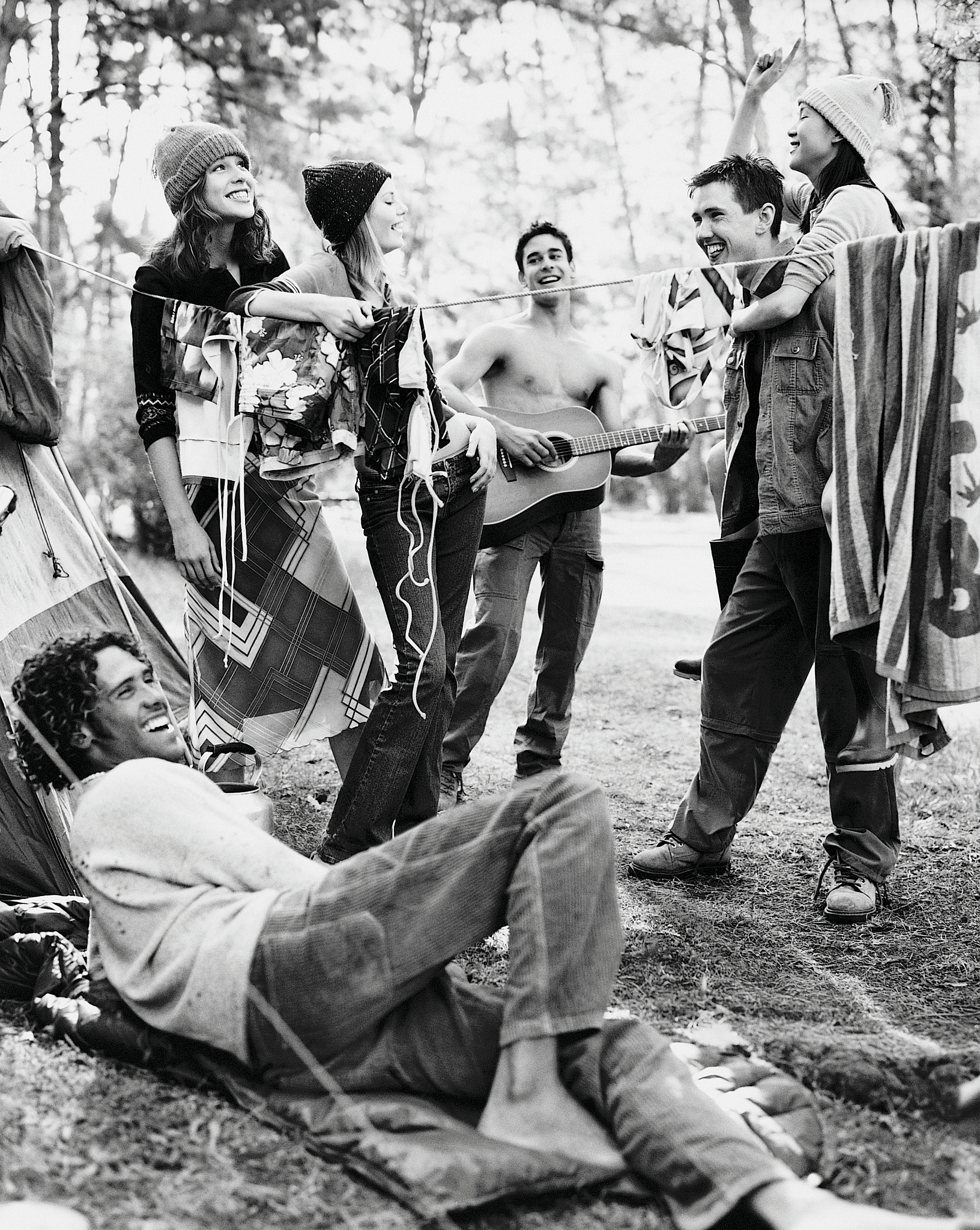 people listening to music in a camp