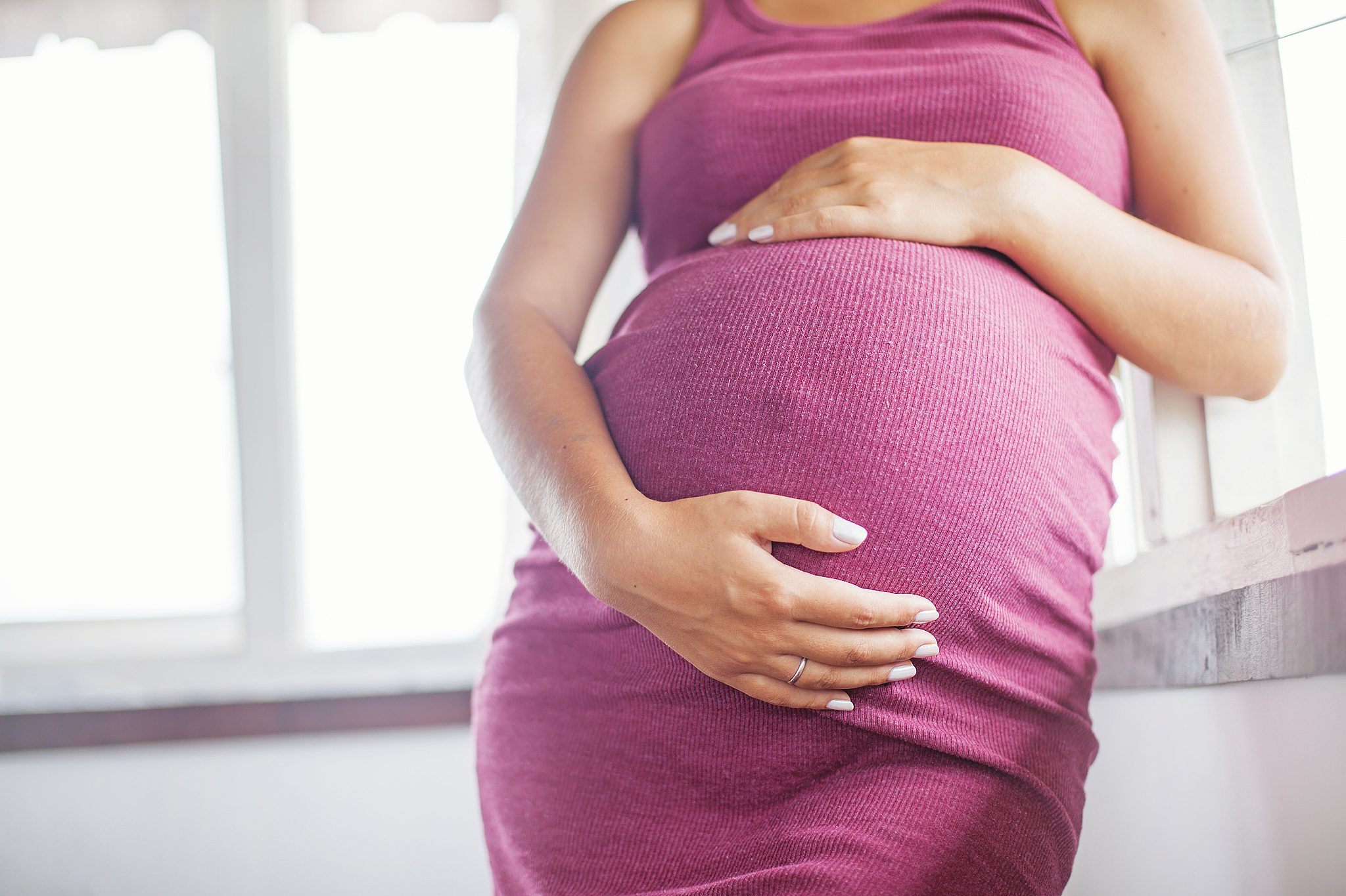 pregnant women and the window