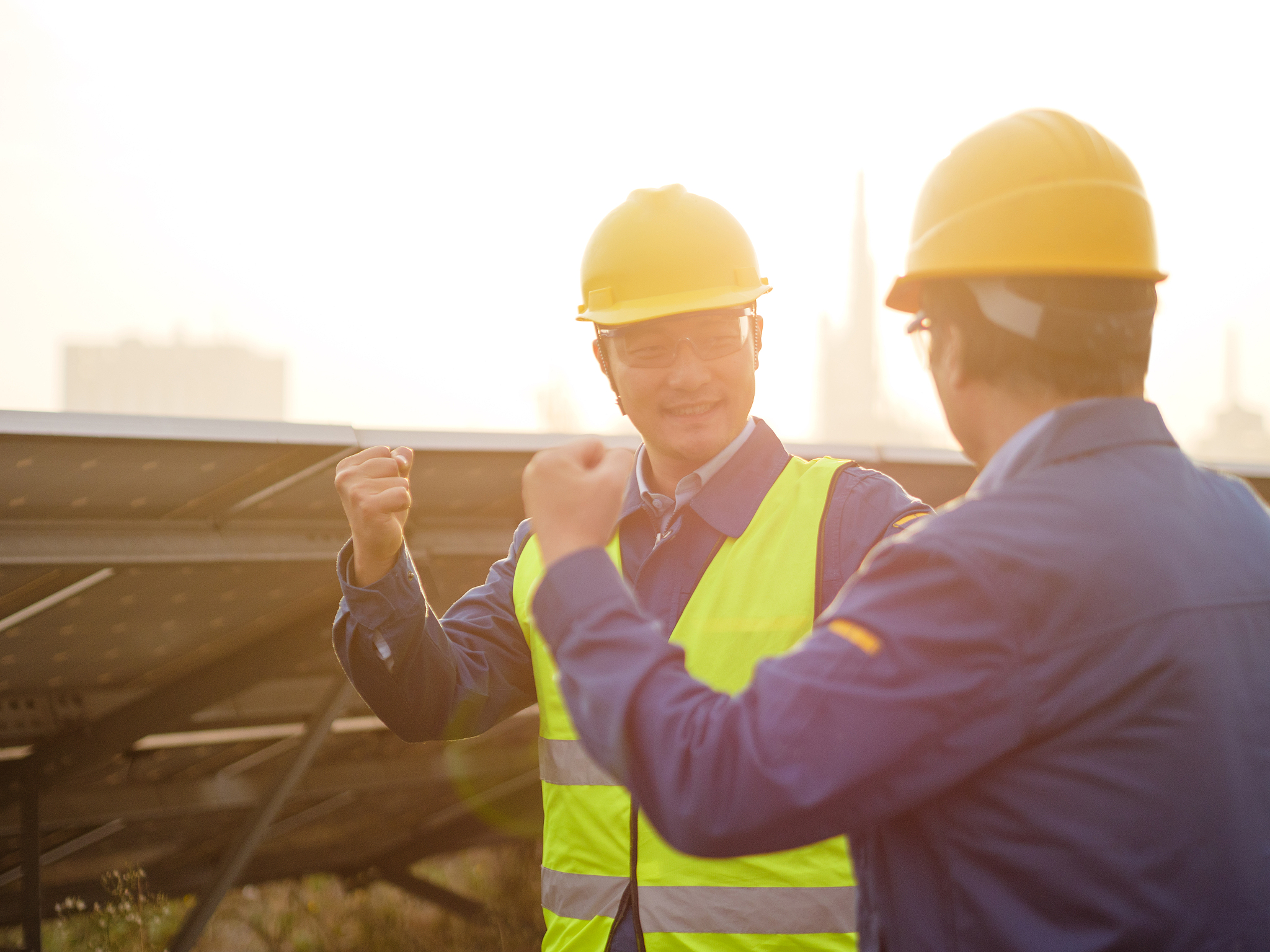 asian engineer working in solar power station