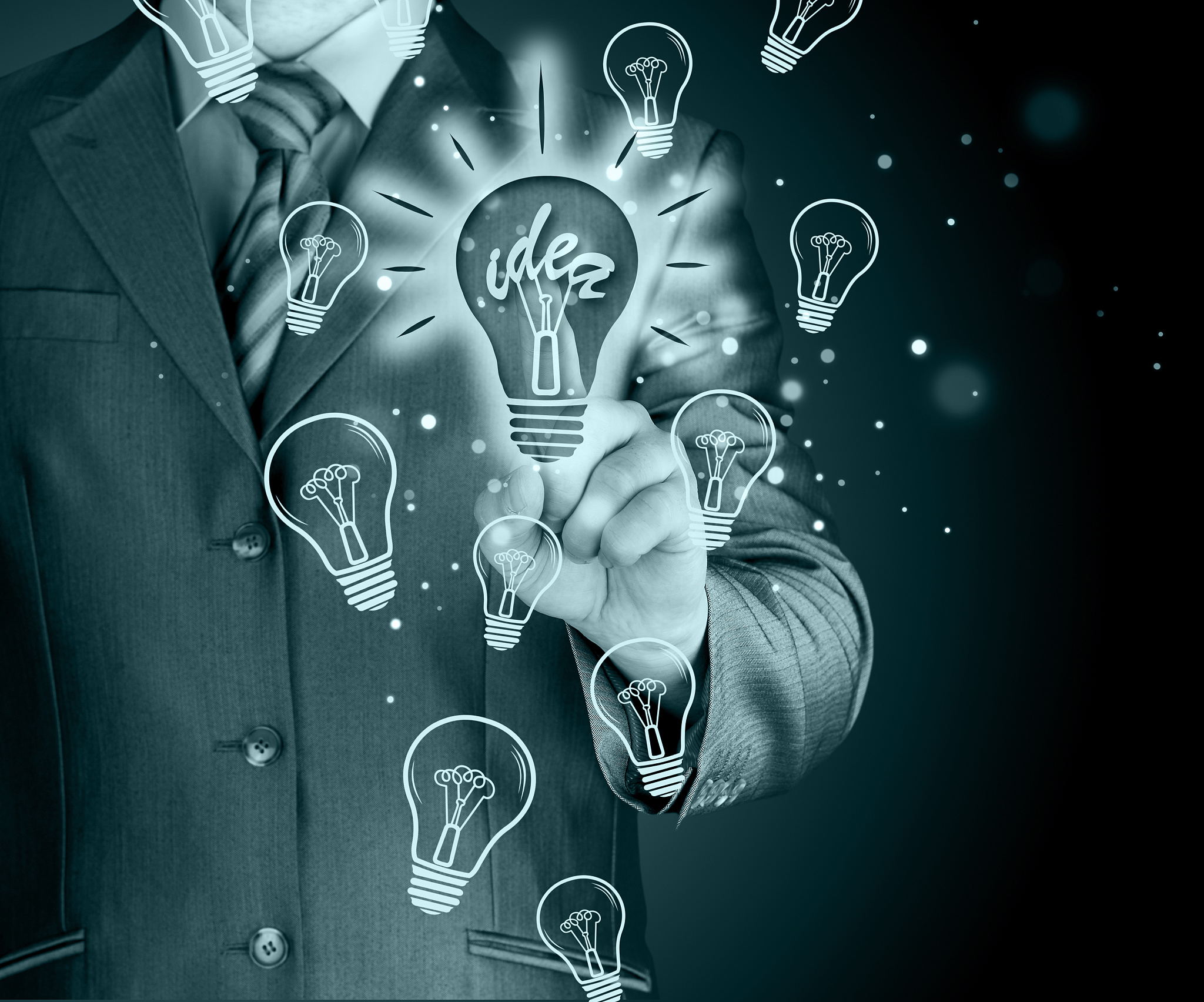 business man touching light of idea