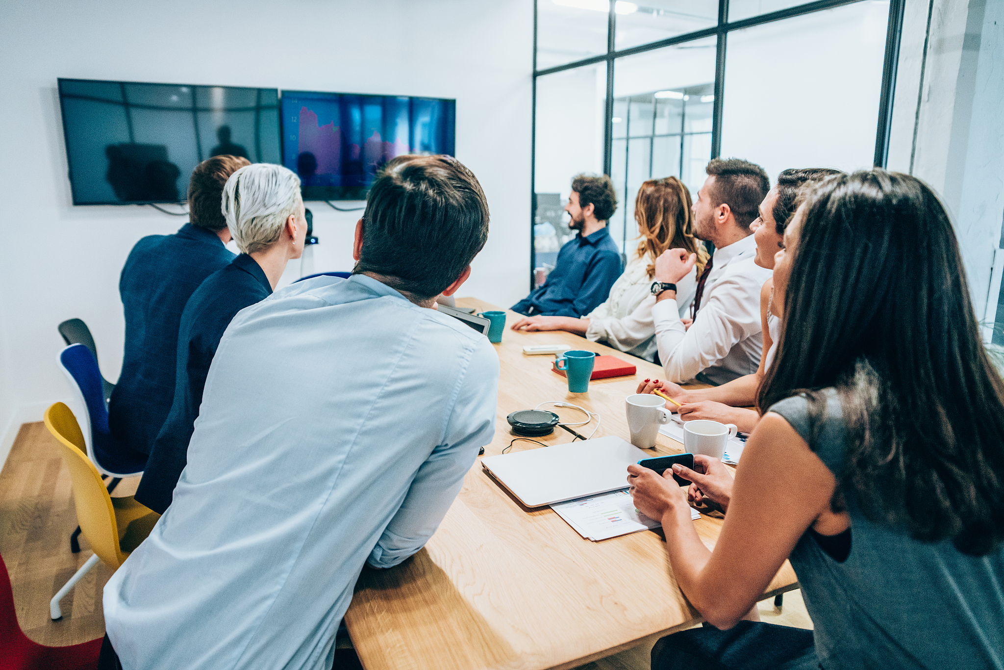 colleagues at business meeting in conference room