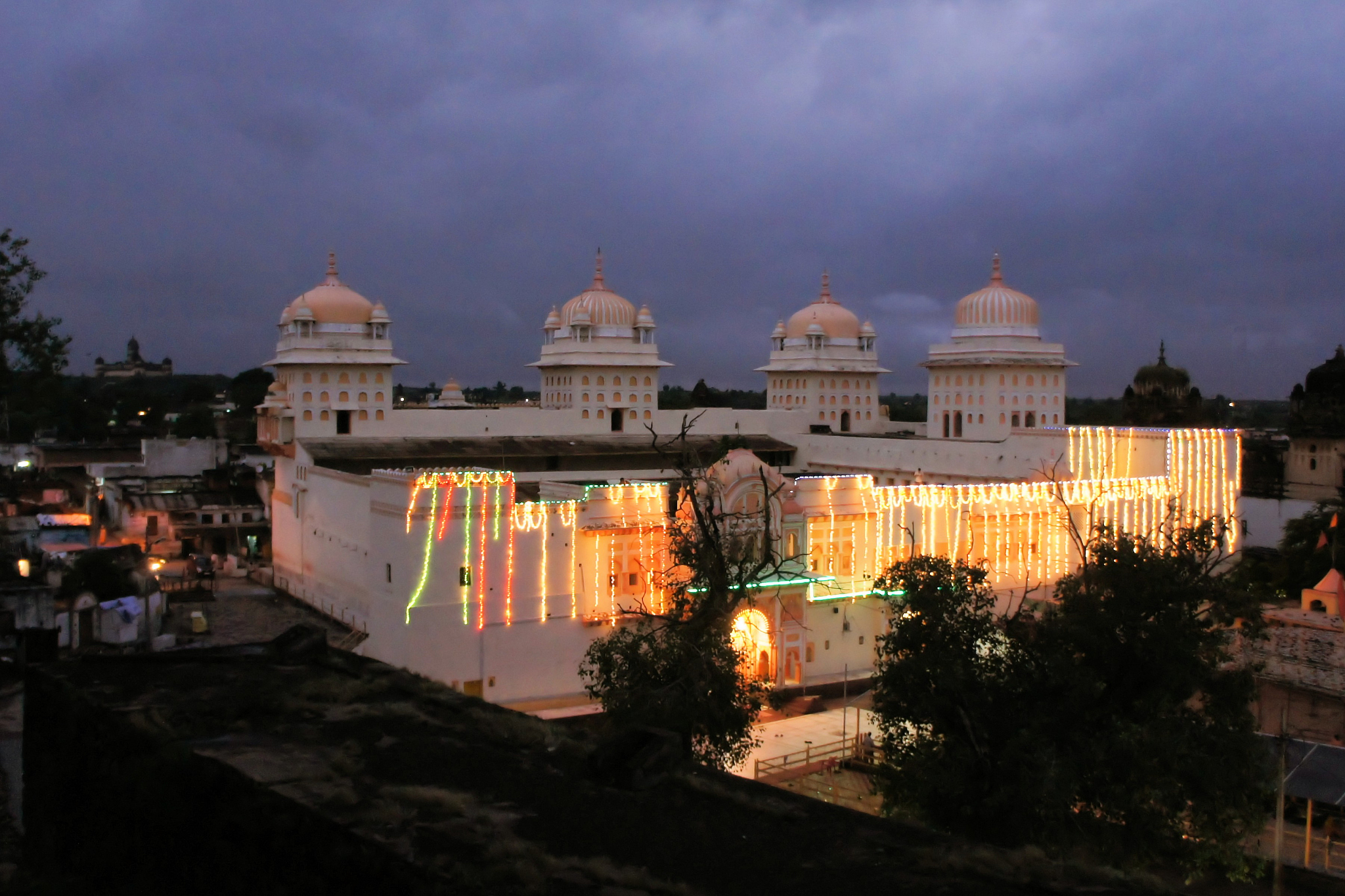 illuminated white hindu temple orchha, india