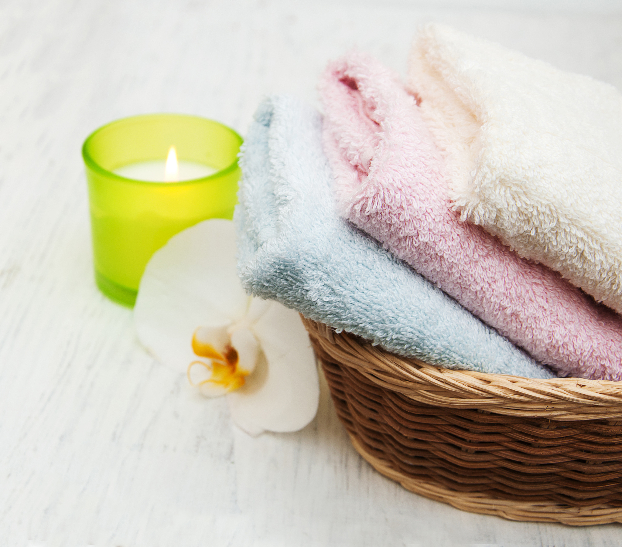 orchids, candle, towels