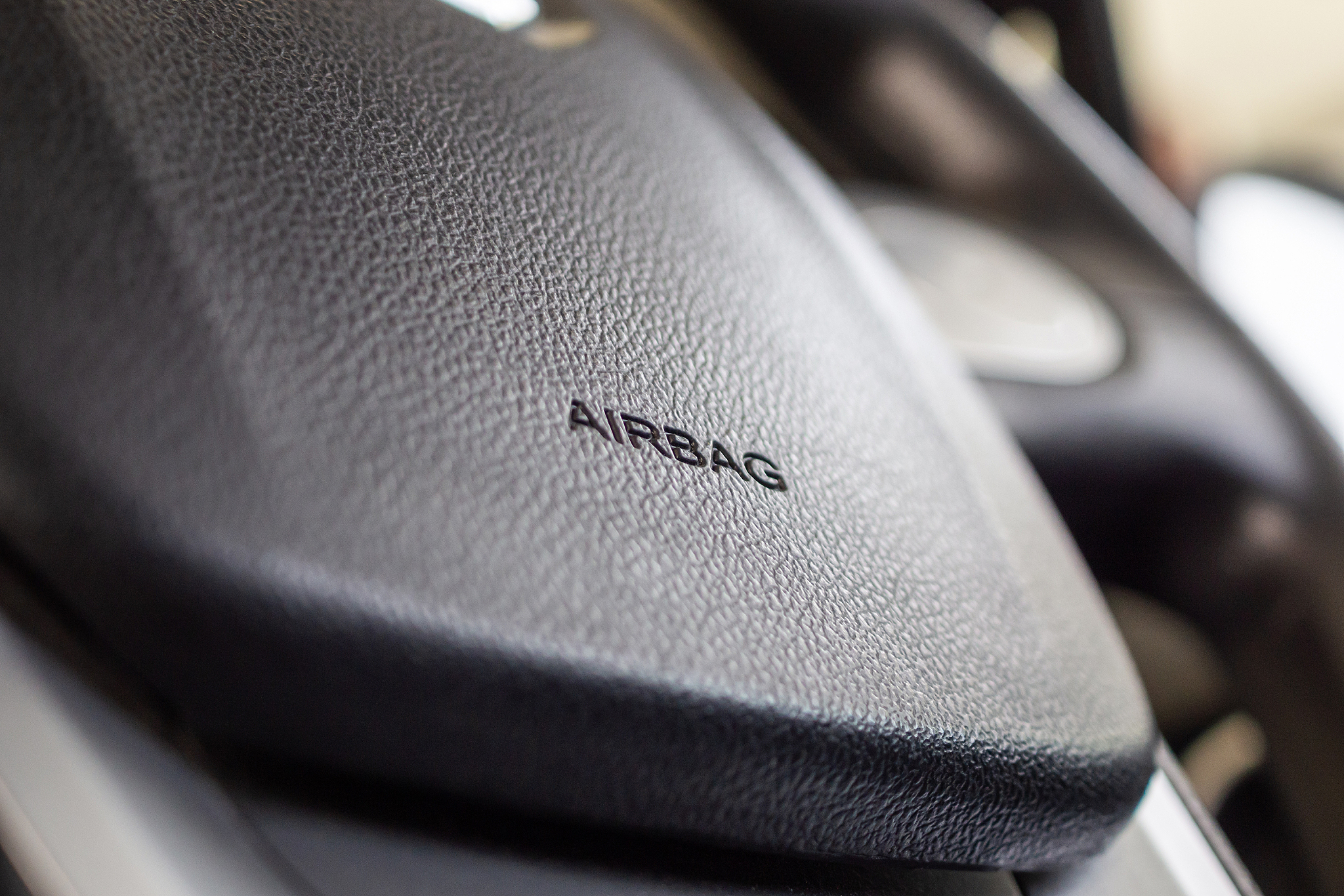 safety airbag sign on car steering wheel