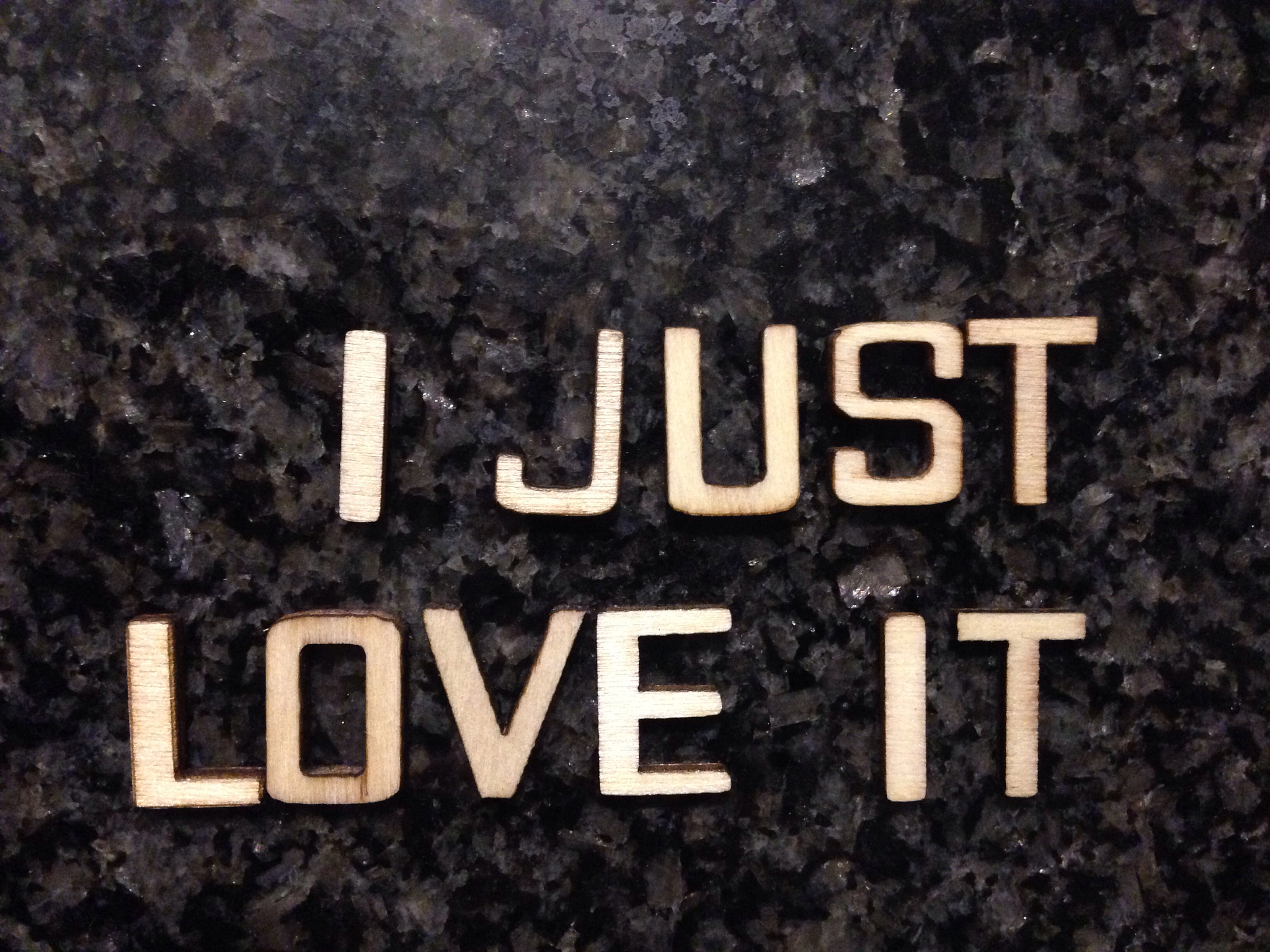 love you quotation wood on marble