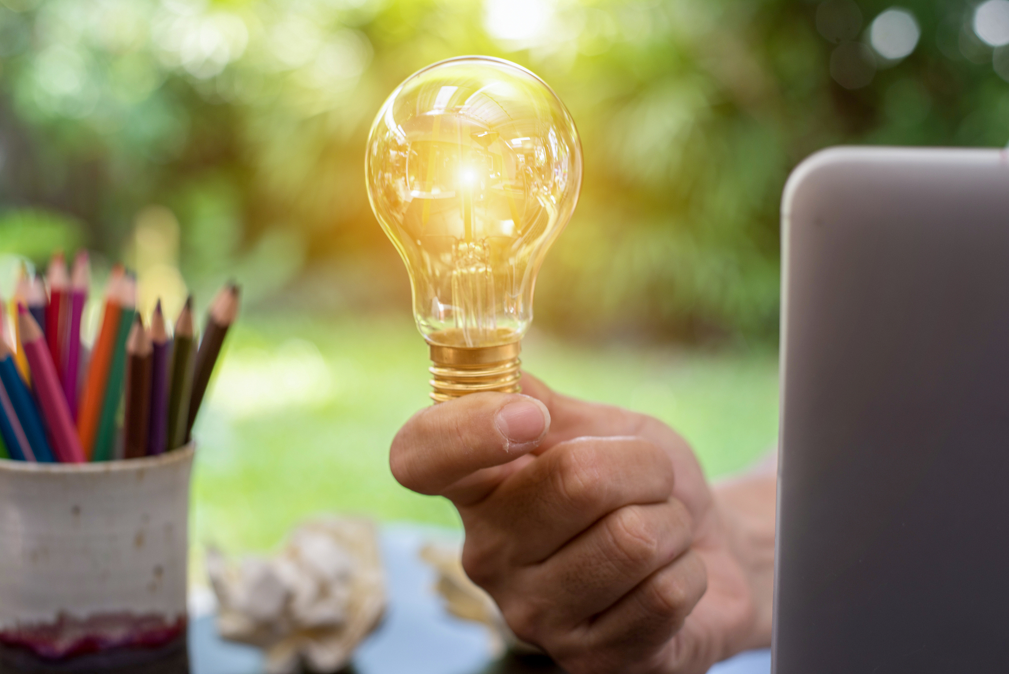 business women holding light bulbs, ideas of new ideas with inno