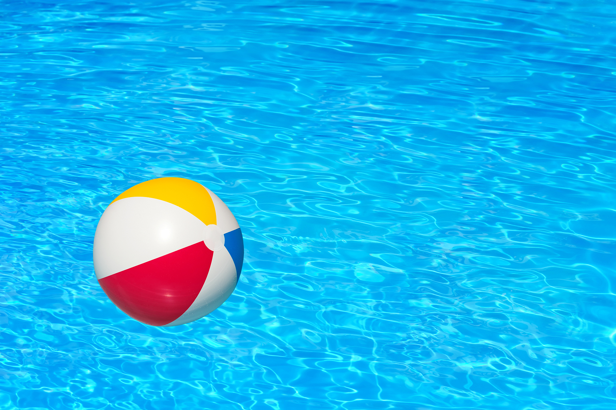 inflatable ball in swimming pool