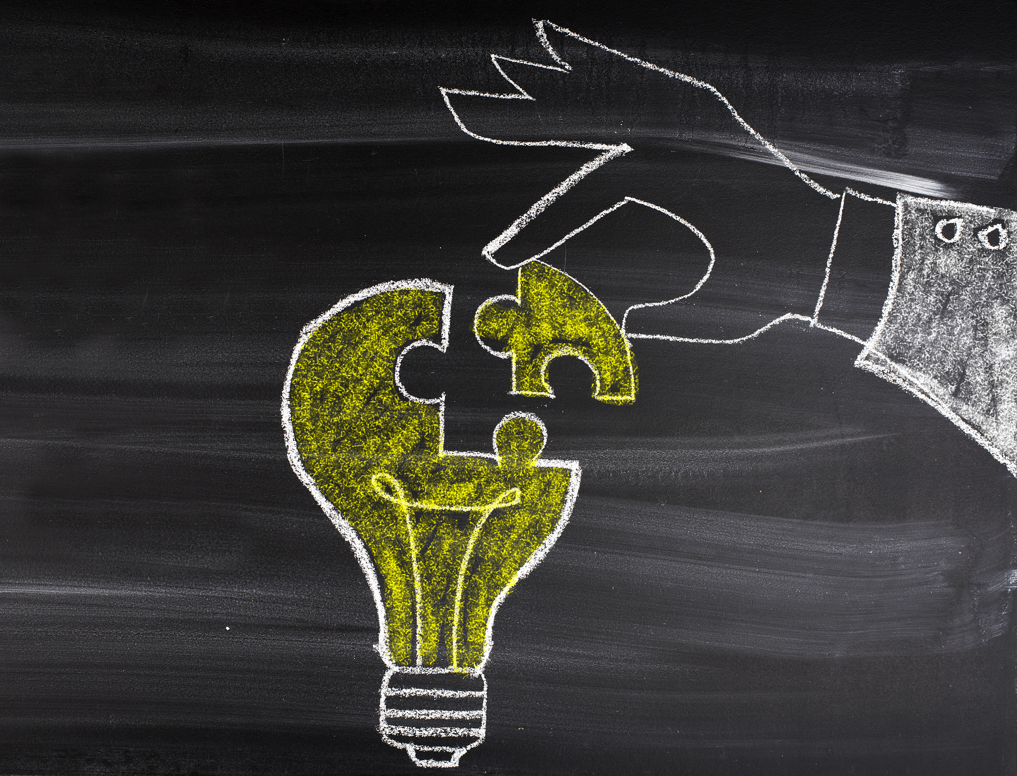 idea creative concept, hand fold light bulb from puzzle