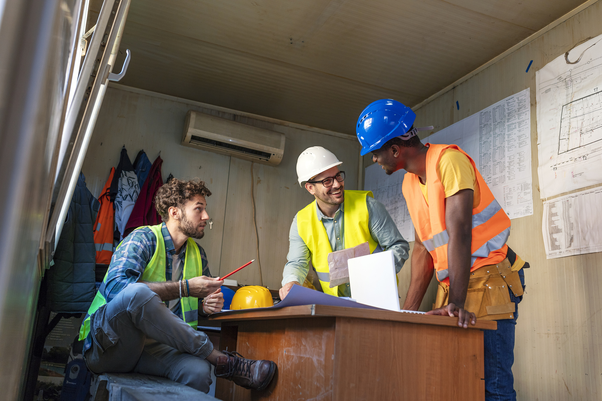 group of industrial engineers with computer