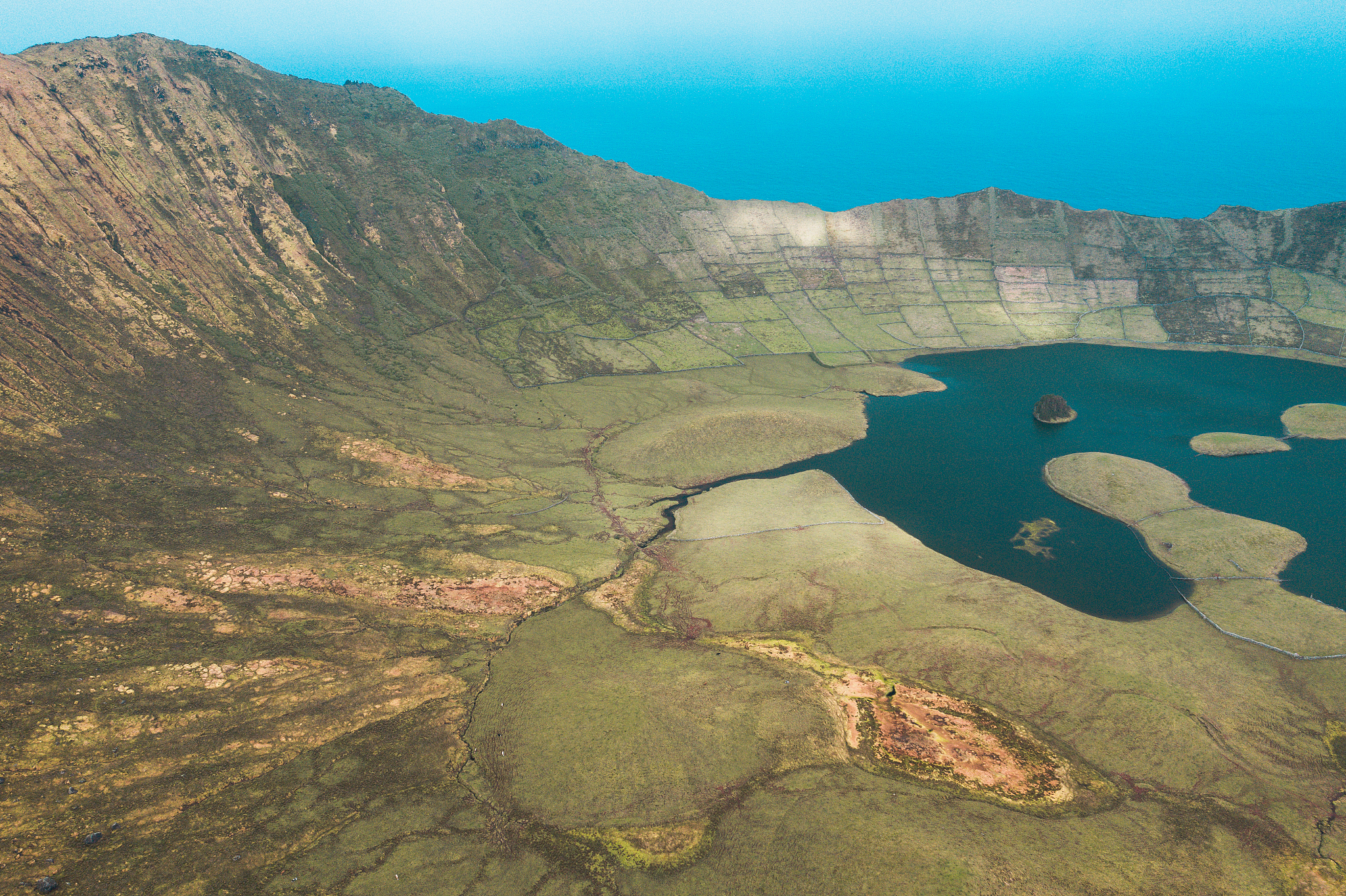 aerial view of volcanic crater (caldeirao) with a beautiful lake