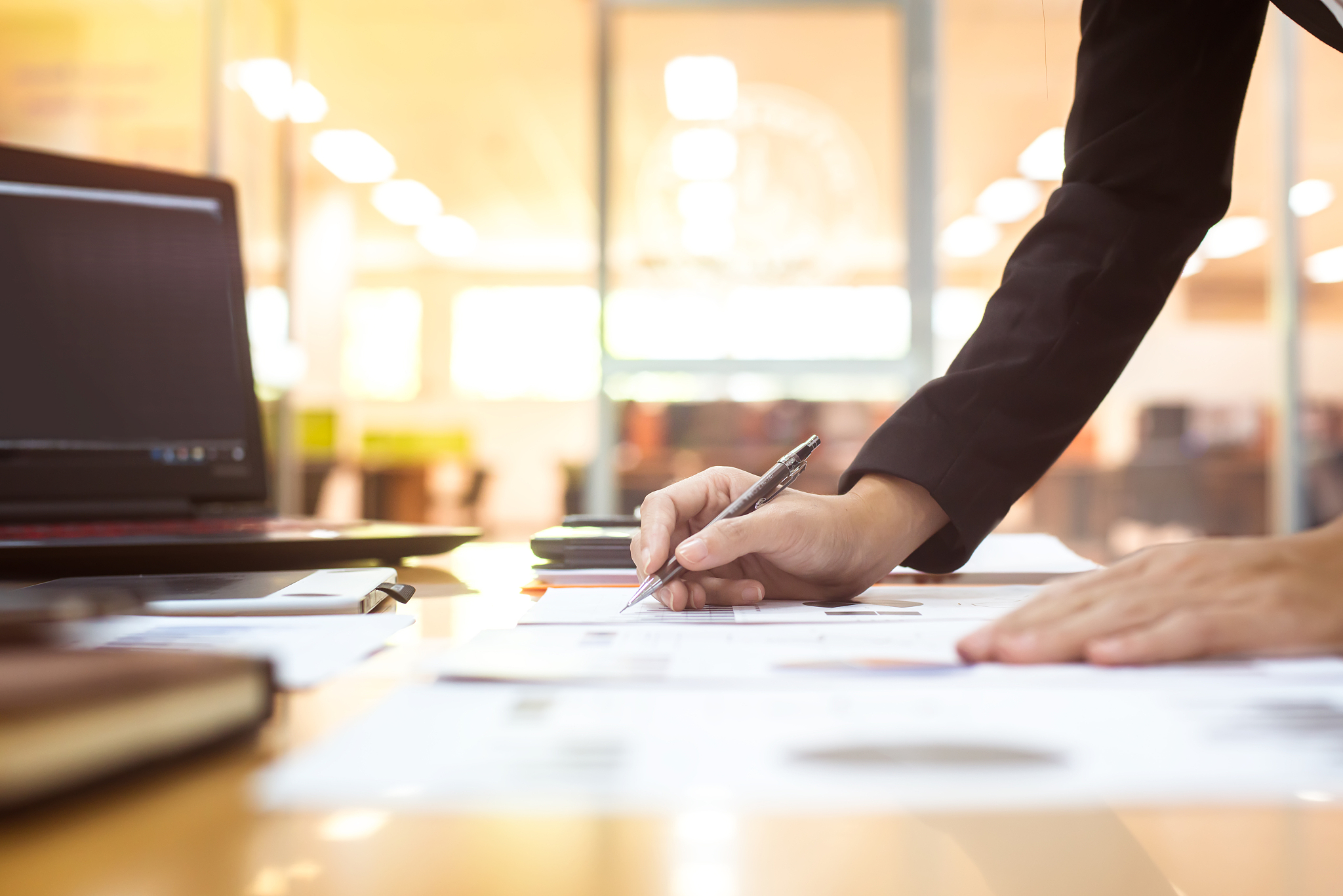 close-up of business person working in office