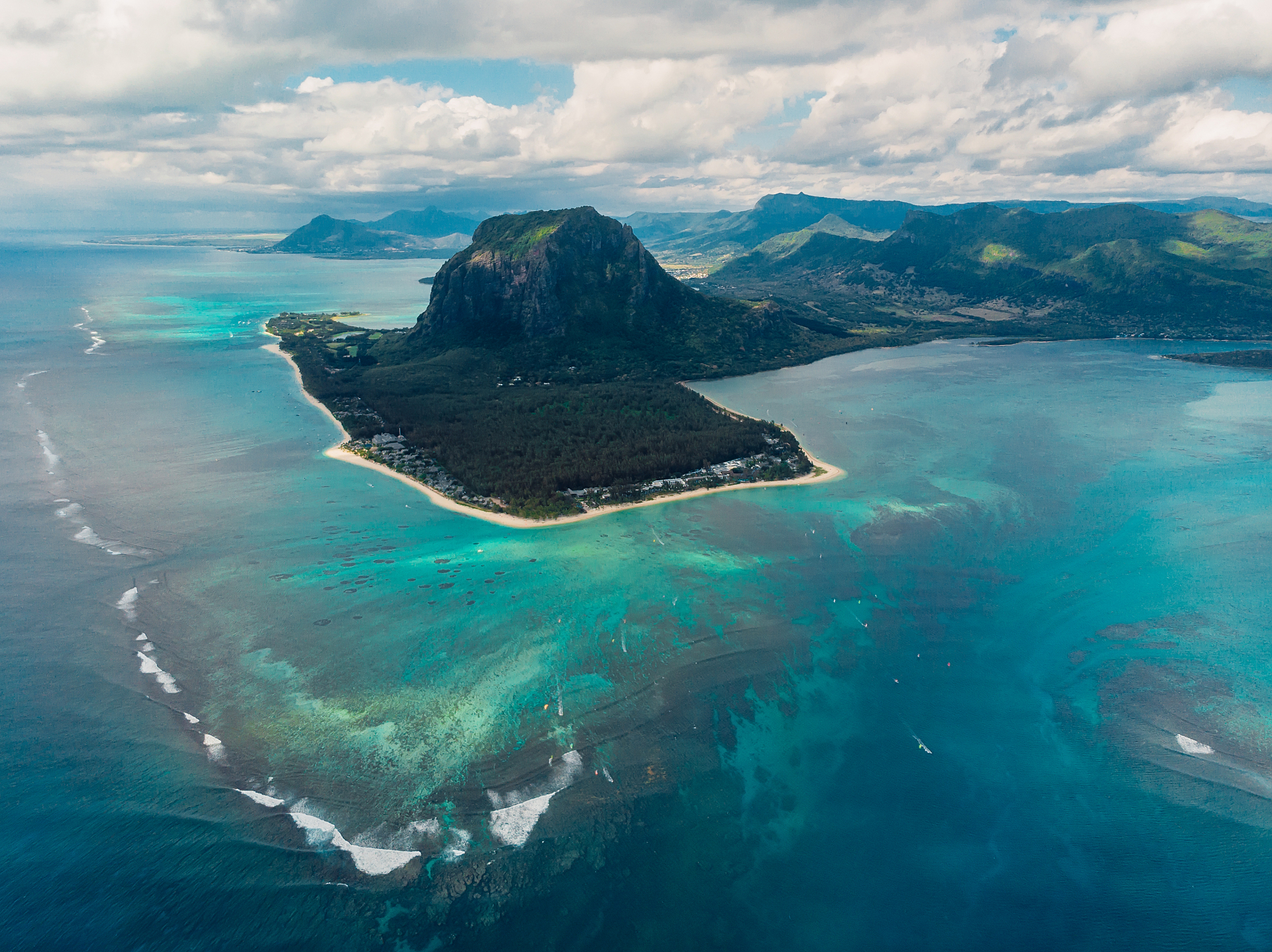 tropical island with le morne mountain, ocean and underwater wat