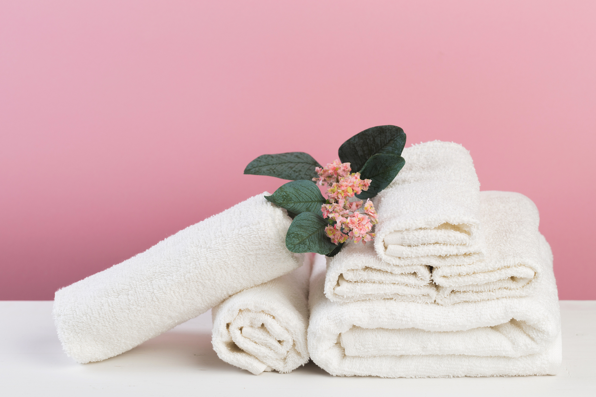 spa still life with aromatic candles, flower and towel. - image