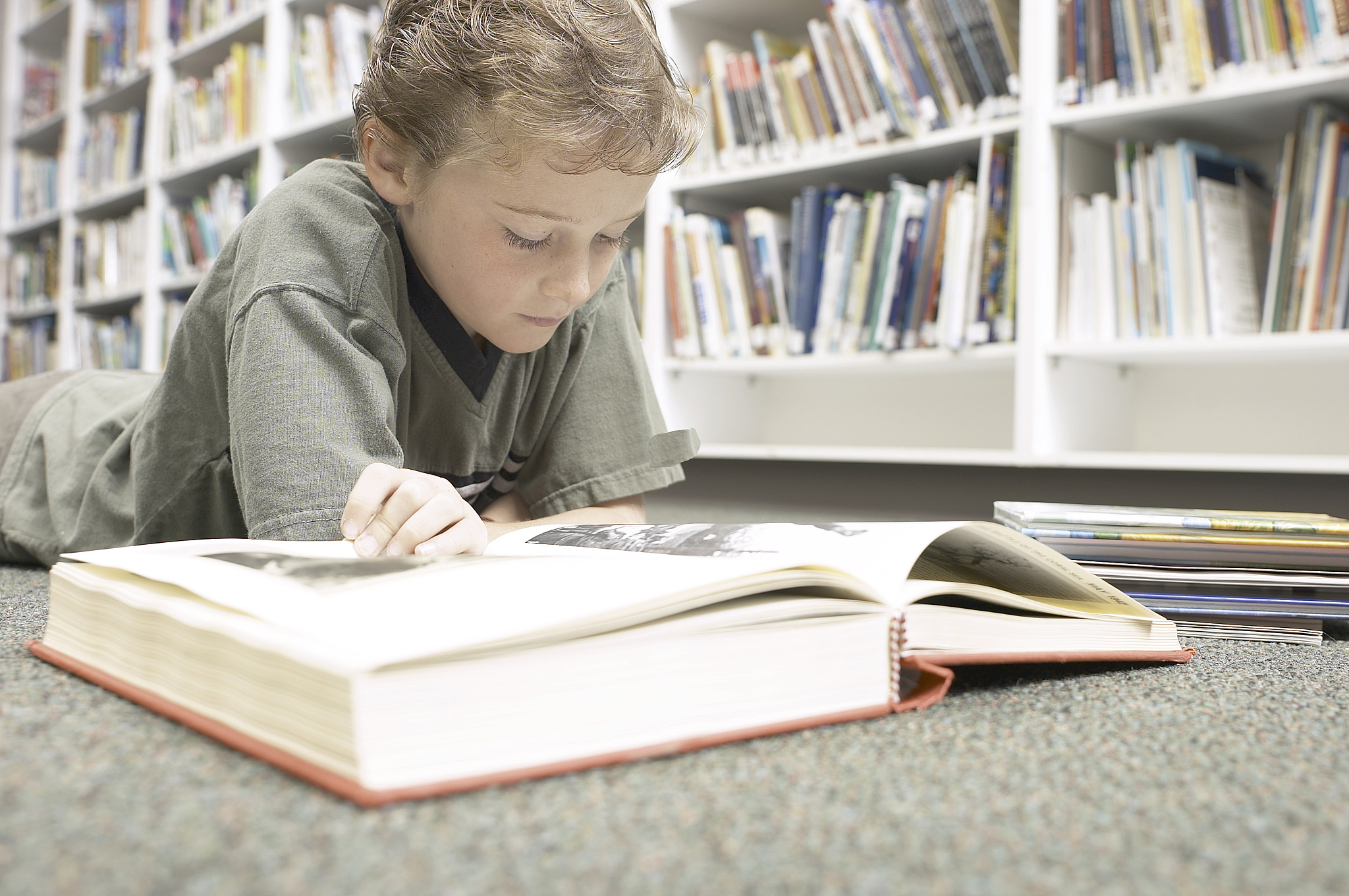 boy reading a book