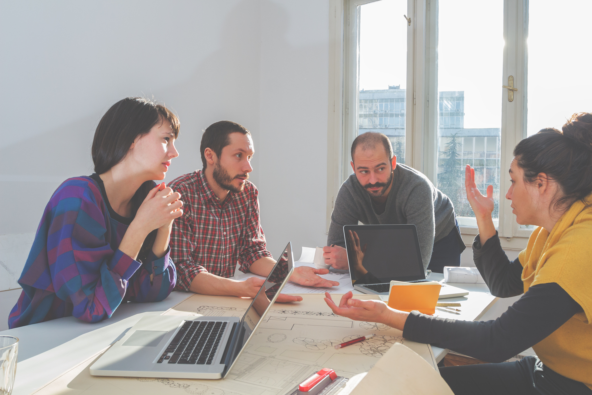 young group of people/architects discussing business plans