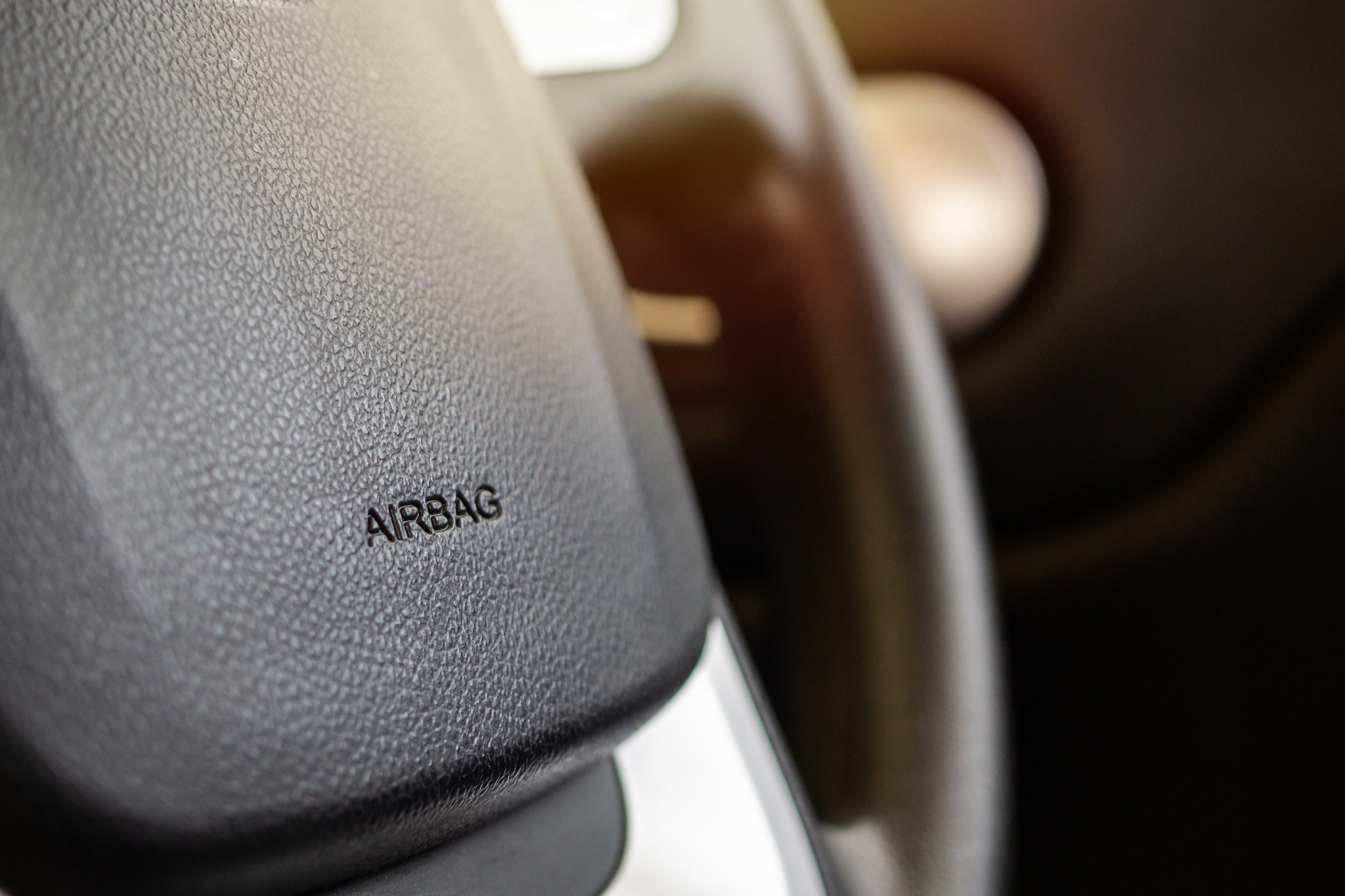 safety airbag sign on car steering wheel