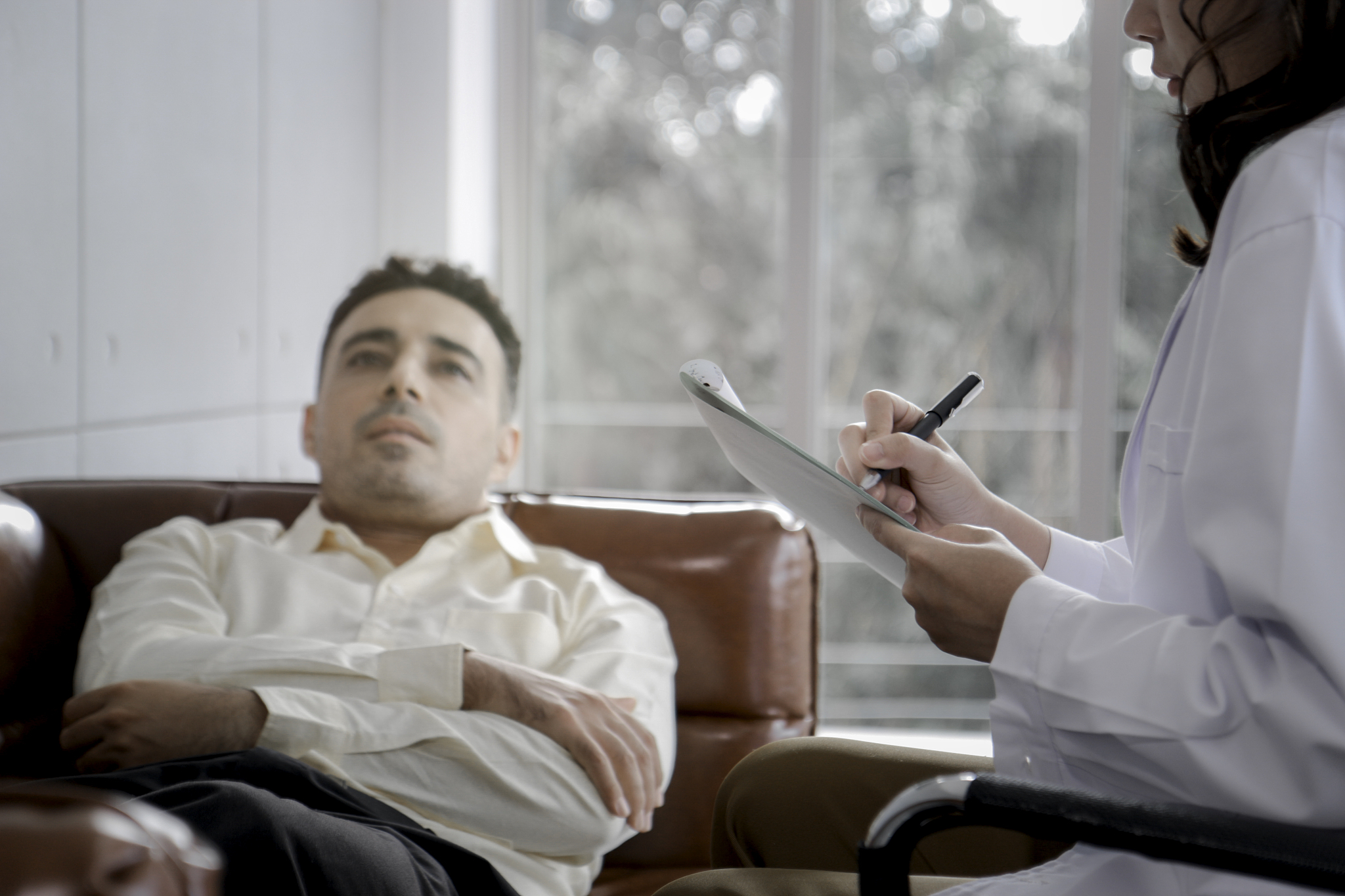 depressed patient having consultation with psychiatrist doctor, 