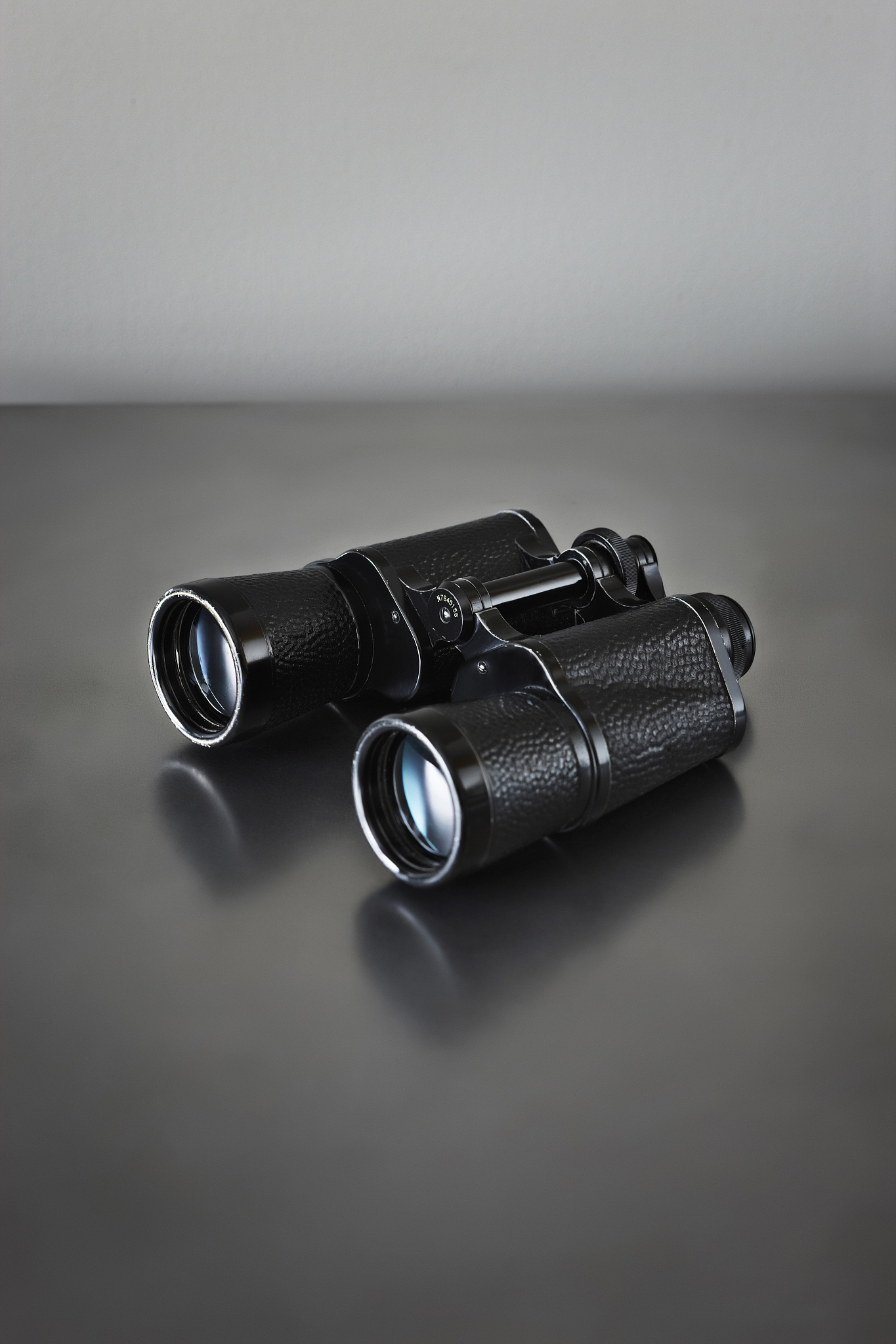 binoculars on a table