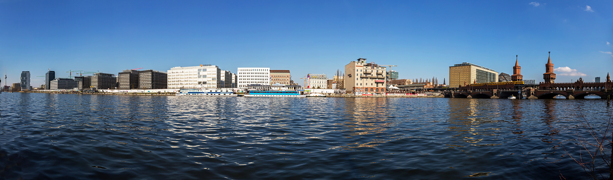 spree river with berlin skyline 'mediaspree' panorama (kreuzberg